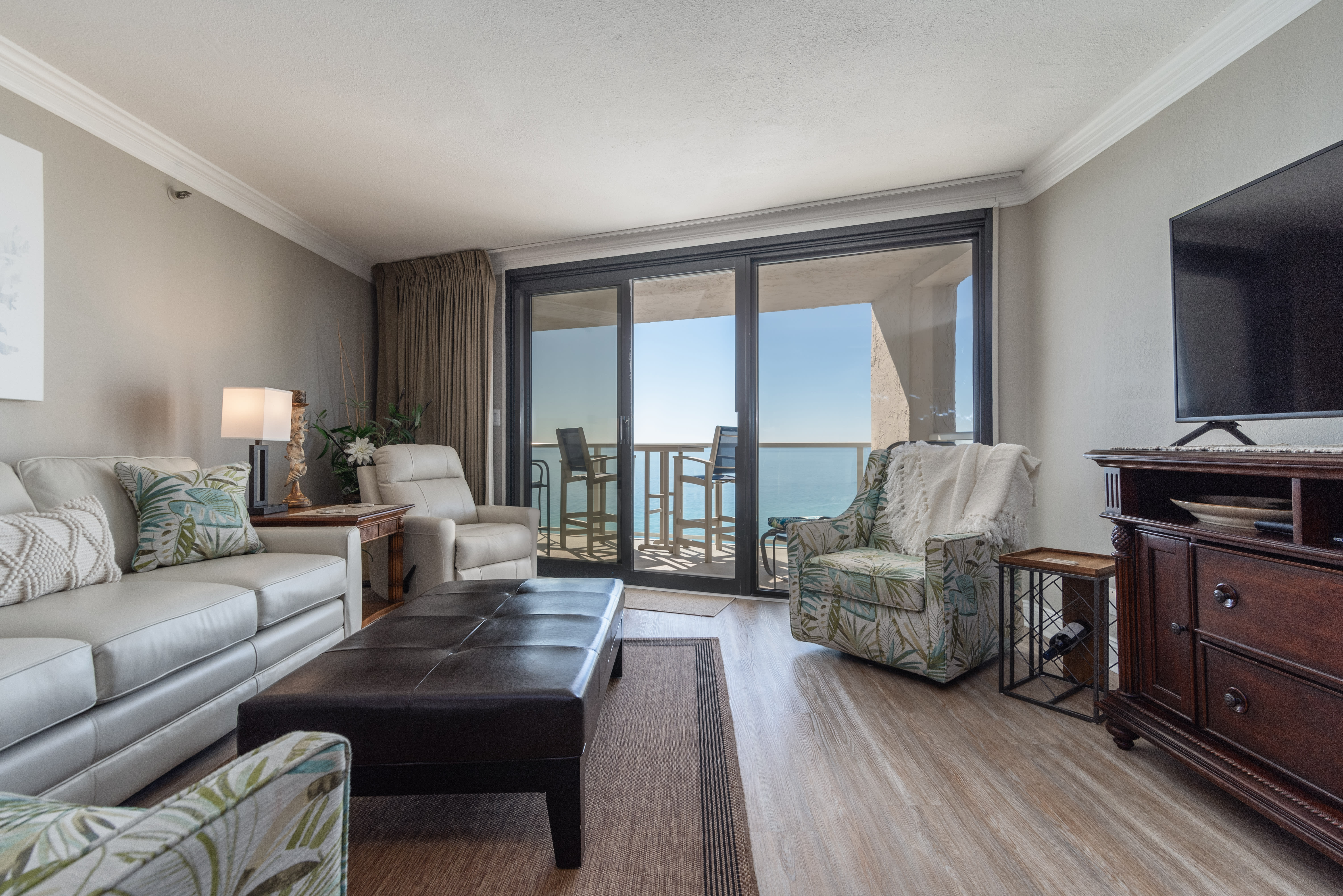 Living Room two comfy swivel chairs and a leather recliner smart TV