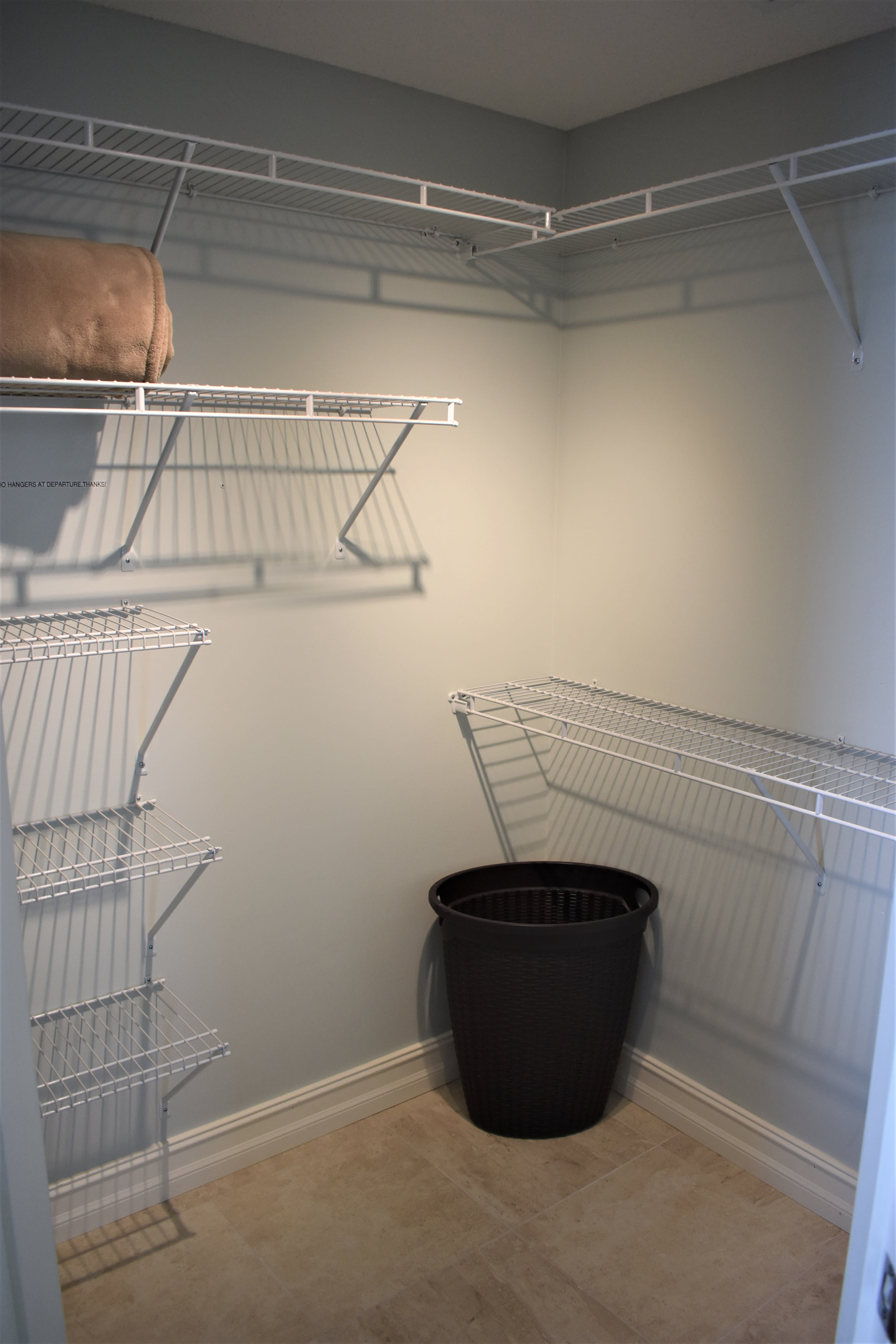 Large well lit walk-in closet in Master bedroom