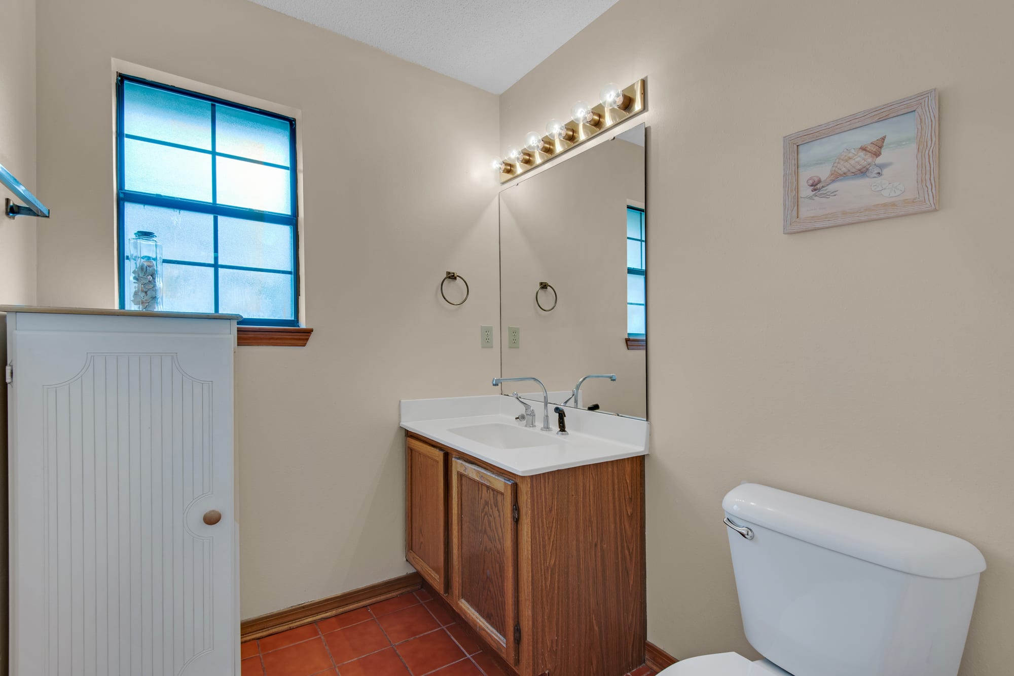 Half bath by the kitchen 