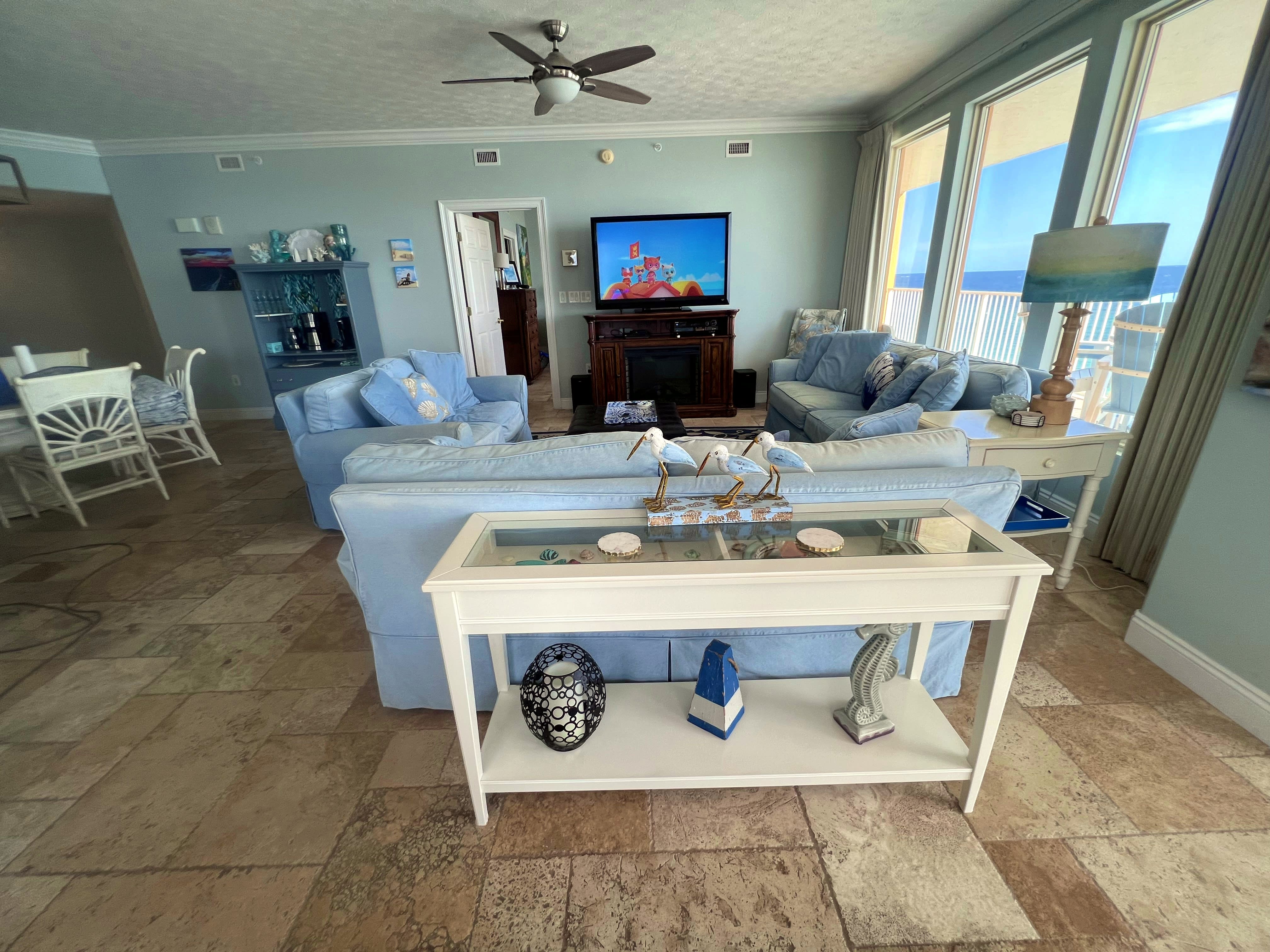Living room with access to our wrap around balcony &amp; view of Gulf &amp; beach