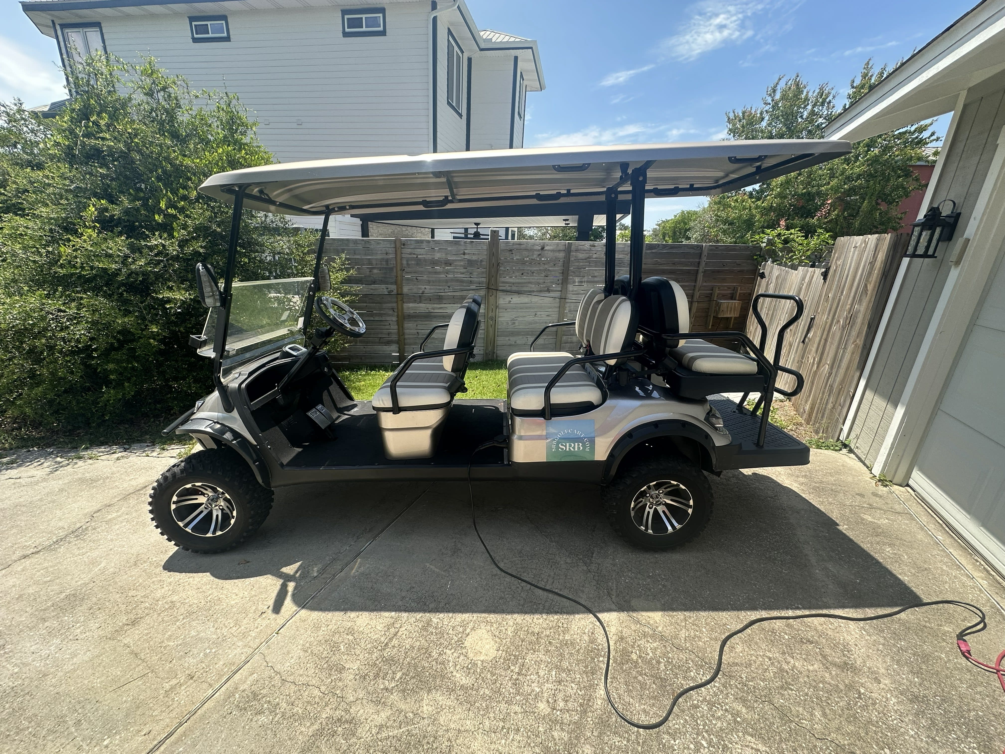 6 passenger golf cart included with weekly rental!