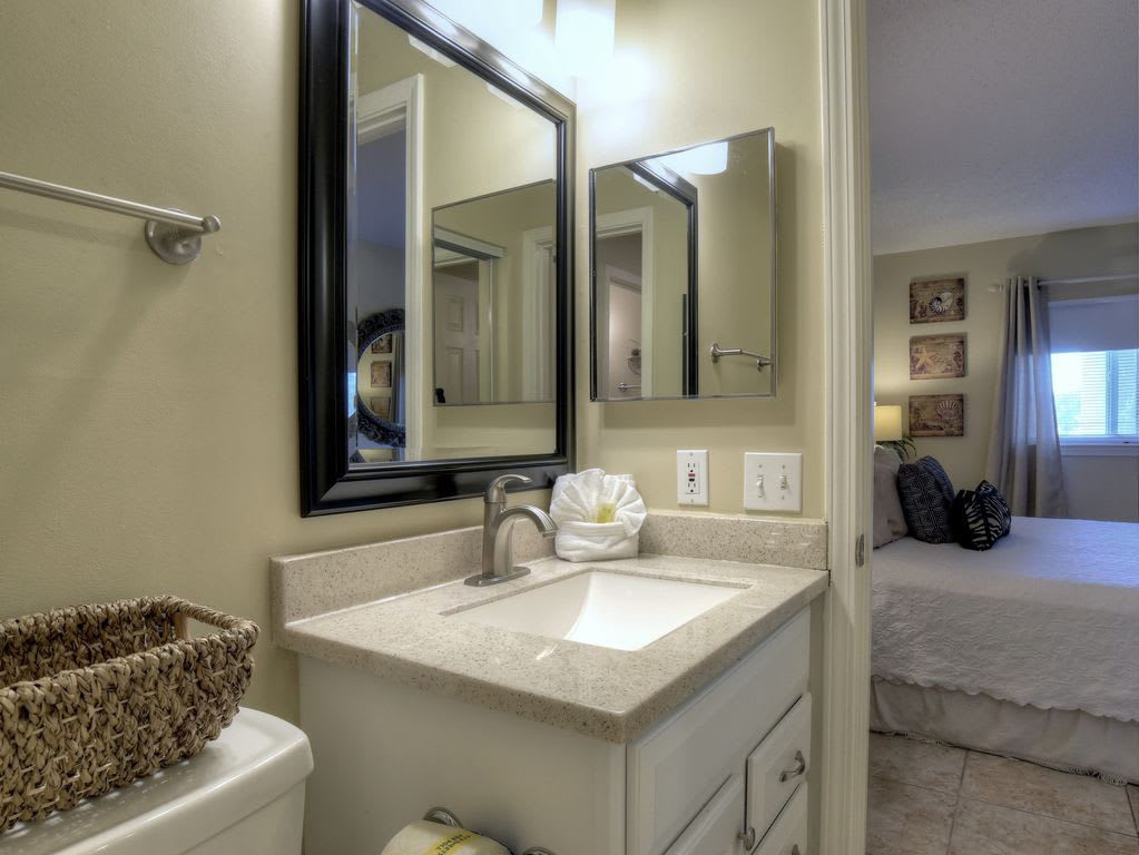 Entrance to private half bath from master bedroom.