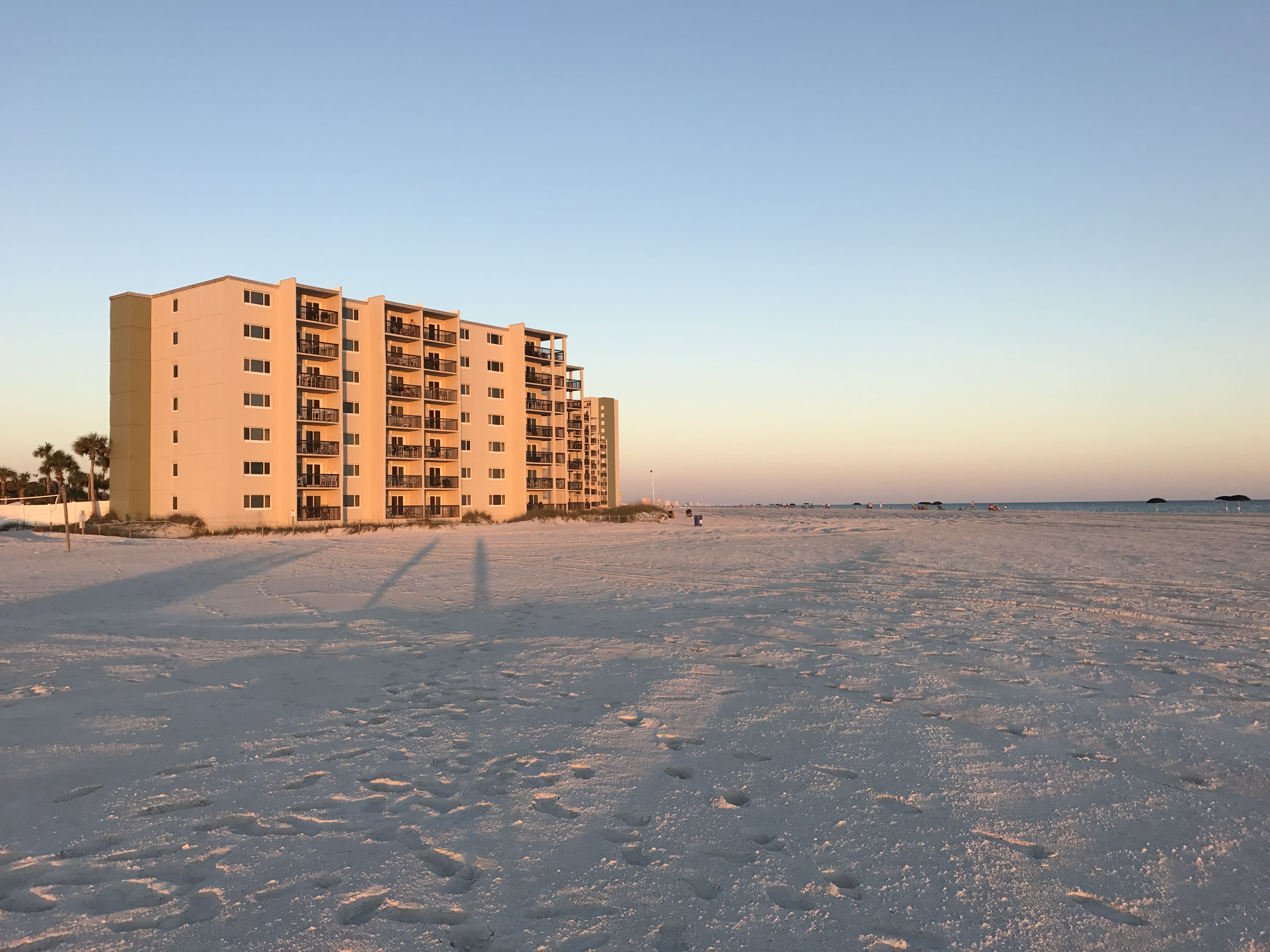 Beach view and condos from Phillips Inlet at sunset