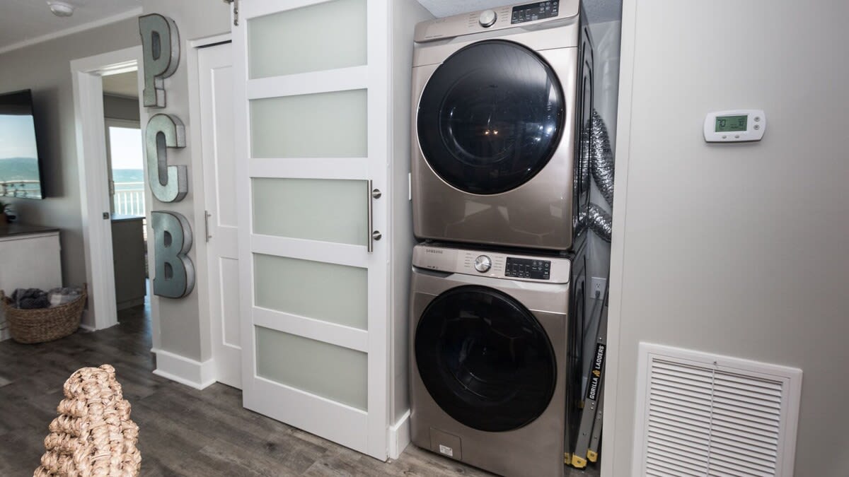 Full-size, large-capacity washer and dryer directly in the unit.