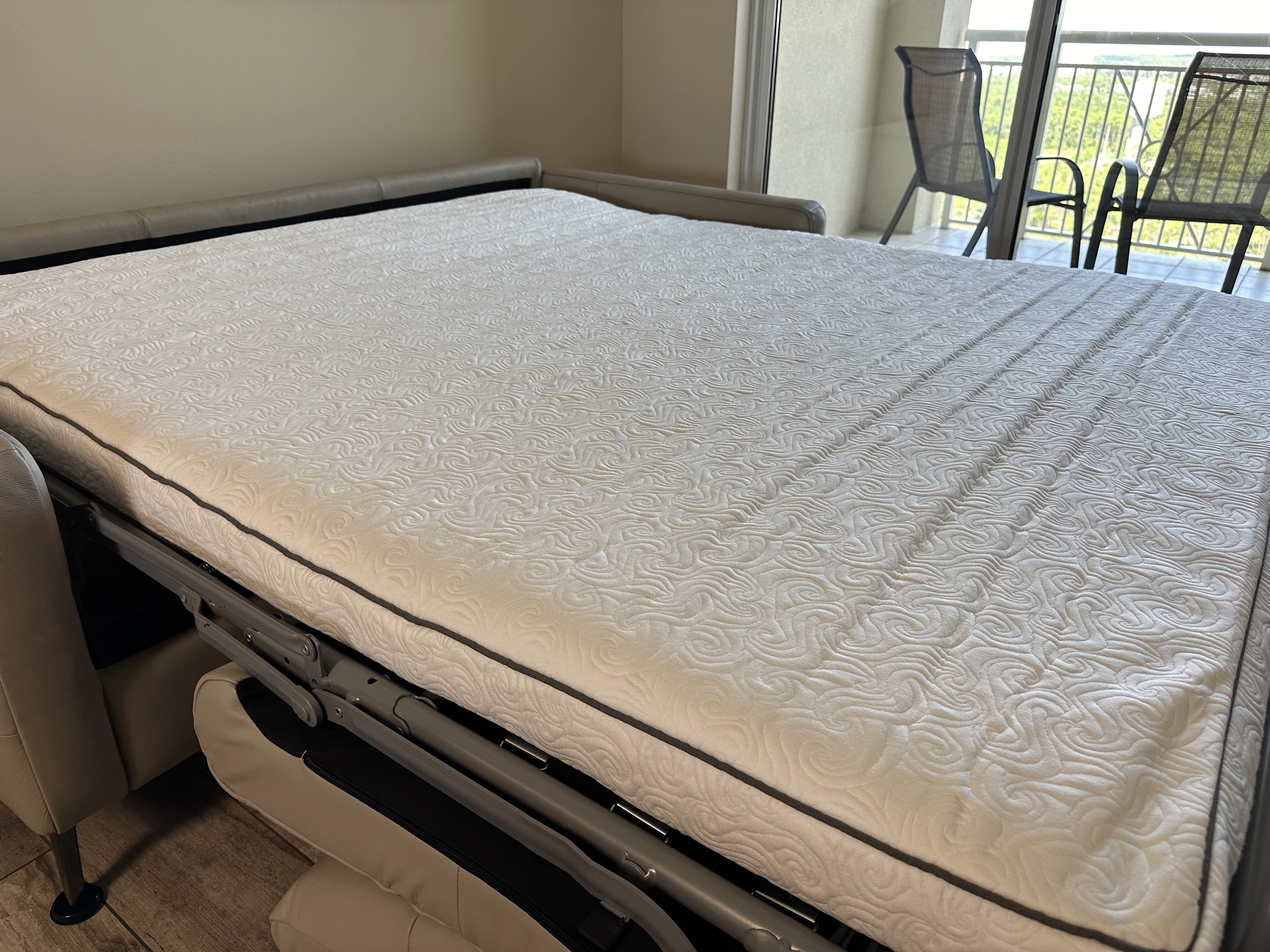 Our new Queen Size Sleeper Sofa by Natuzzi is located in the side "Bonus Den"