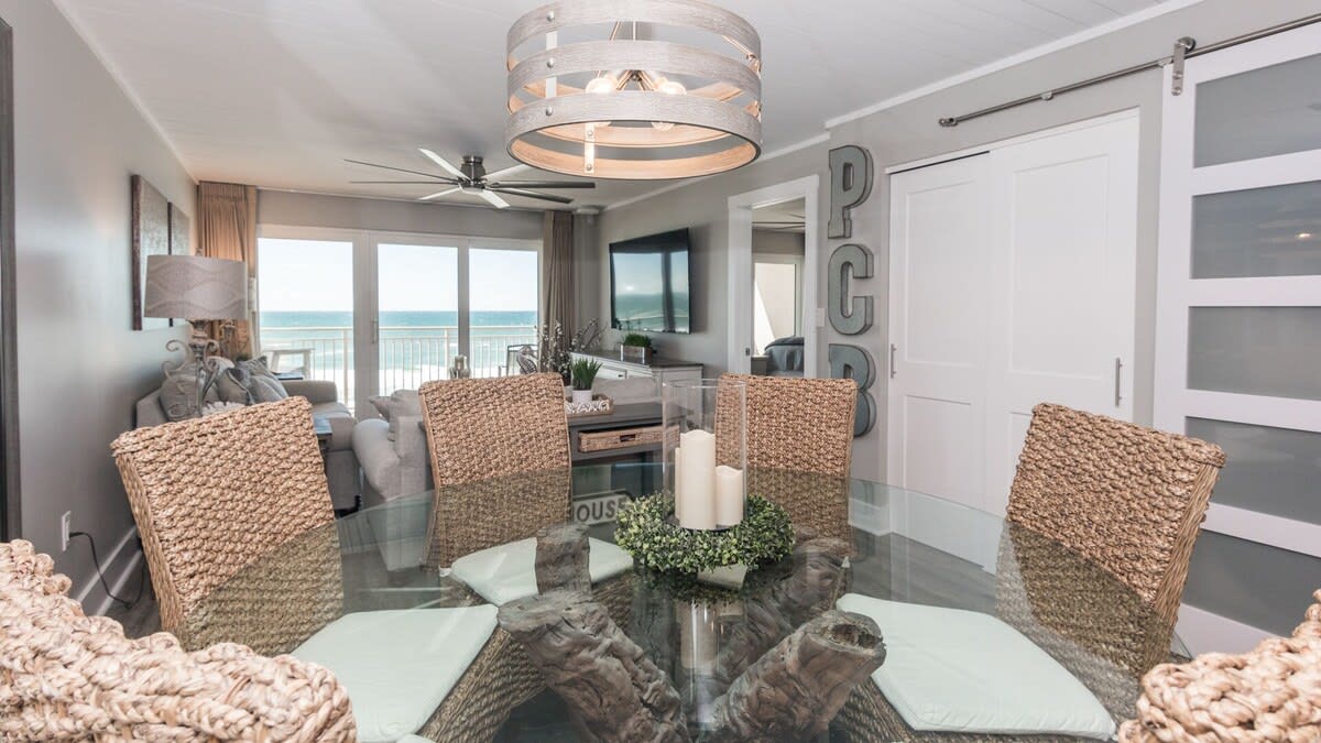 Custom round table with seating for 6 and 3 more spots at the bar.