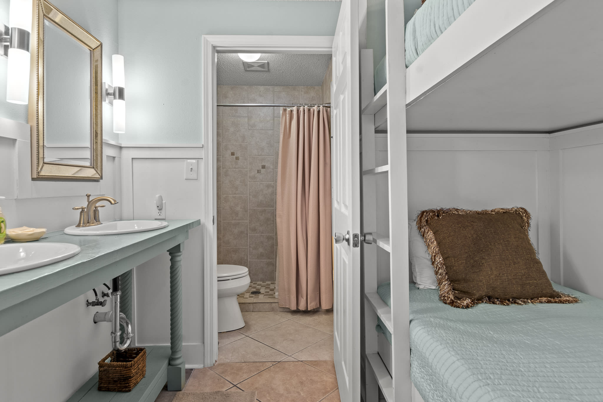 Double vanity and bunk beds.