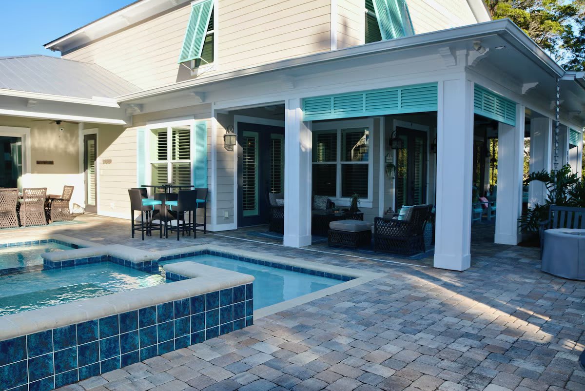 Pool and seating for twenty, hot tub/spa connected to pool.