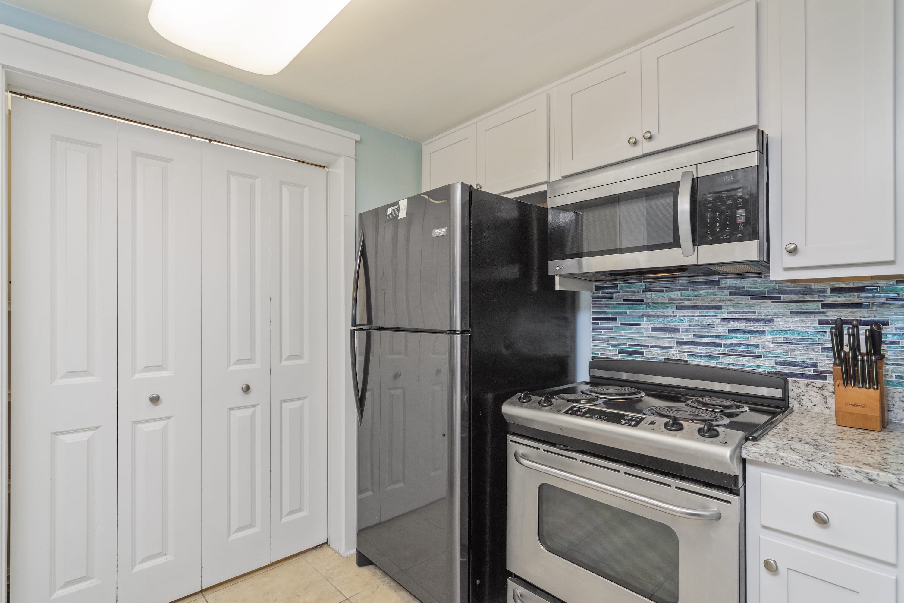 The kitchen is fully stocked - plus a Keurig and coffeepot