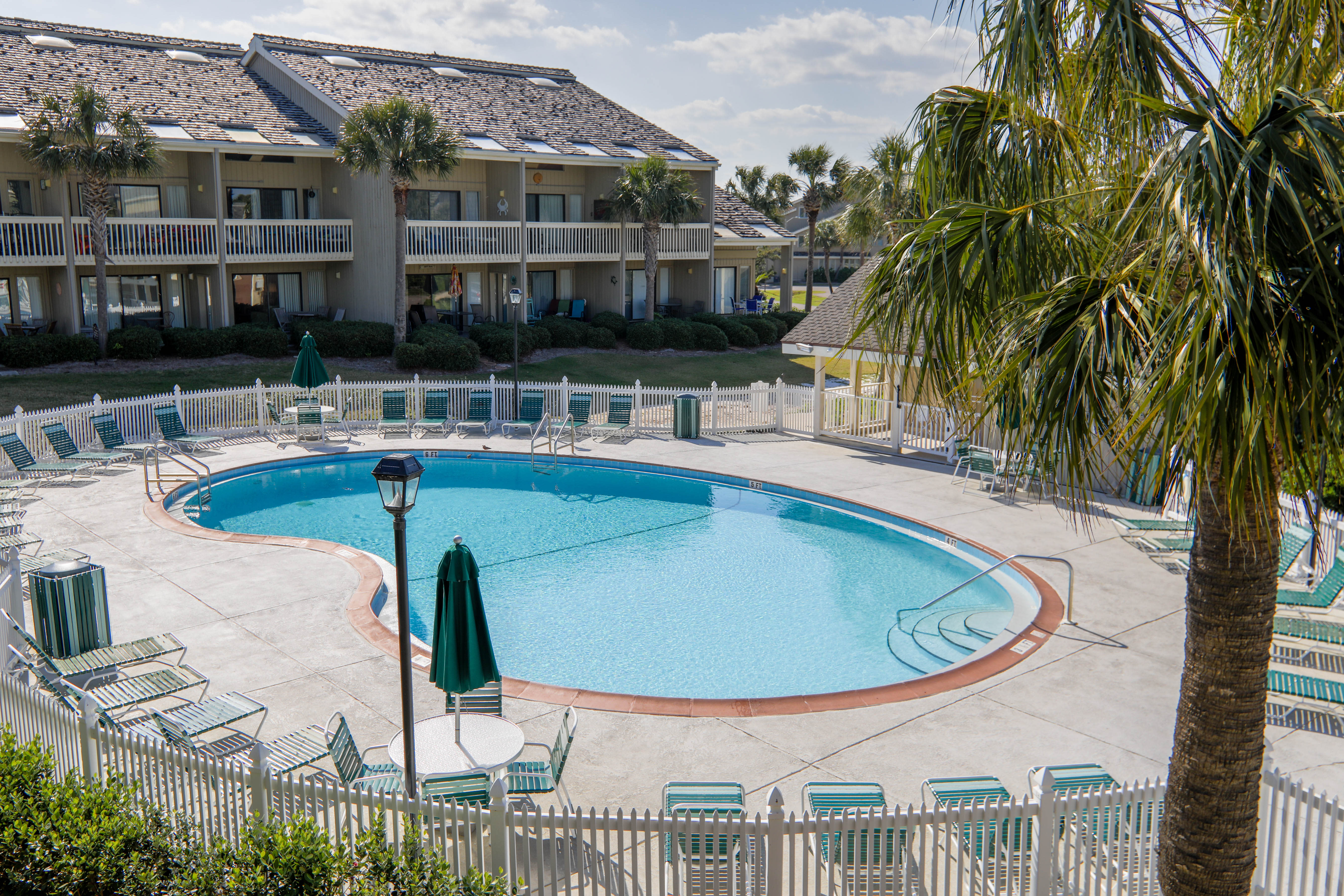 Lakefront pool is 20 steps from the condo.