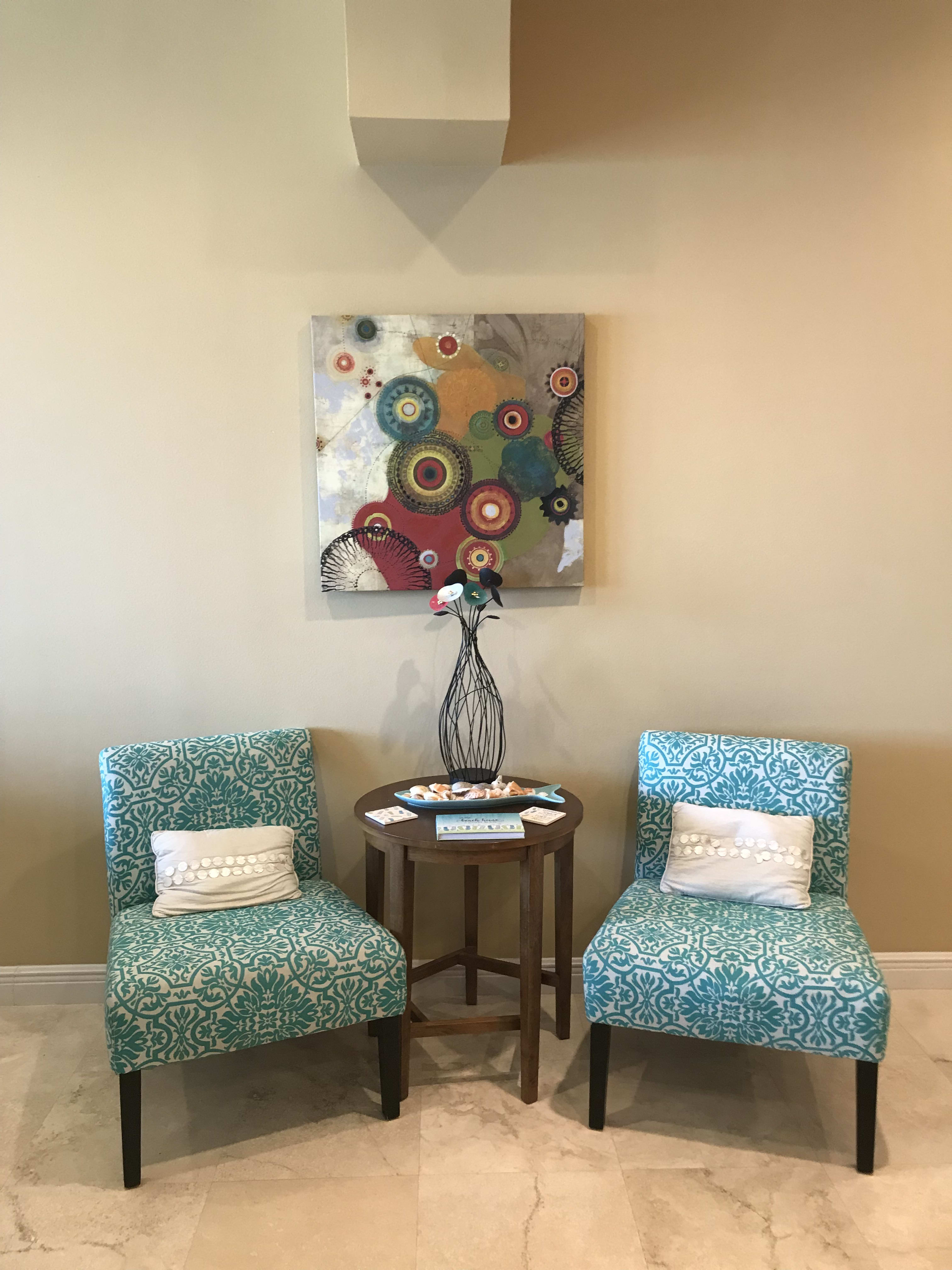 Accent chairs at the top of the stairs. Please sign the guest book here. 
