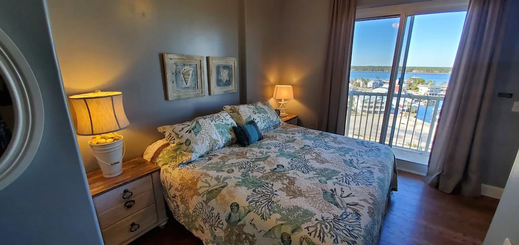 2nd Master Suite with beautiful balcony views of Gulf Shores and the Lagoon.