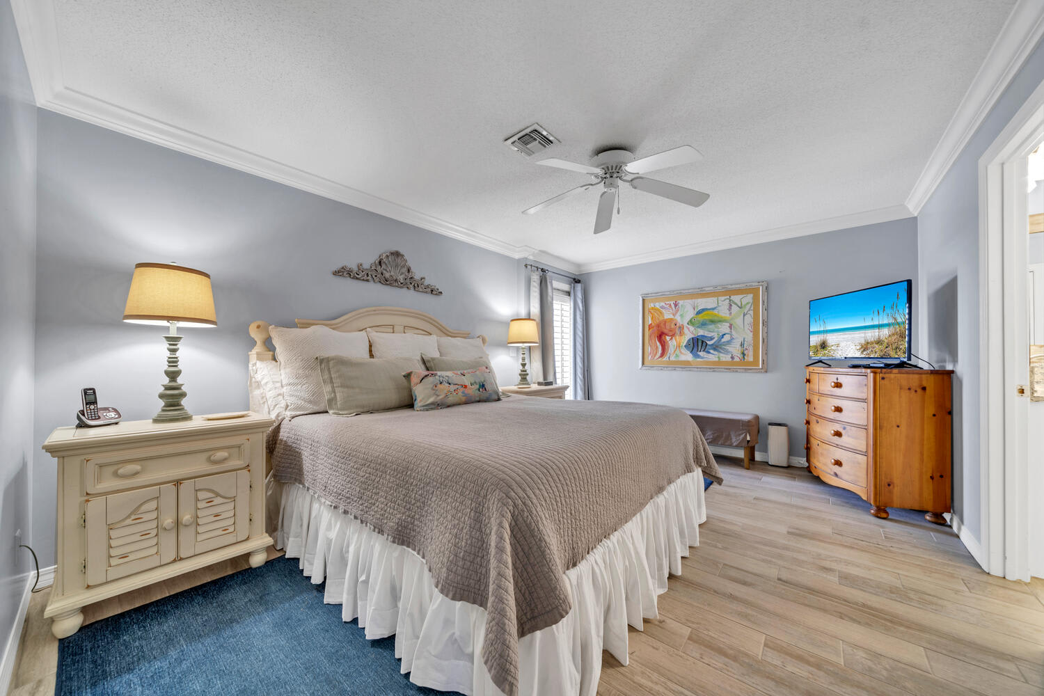 Primary bedroom with king bed, outdoor access and private bath