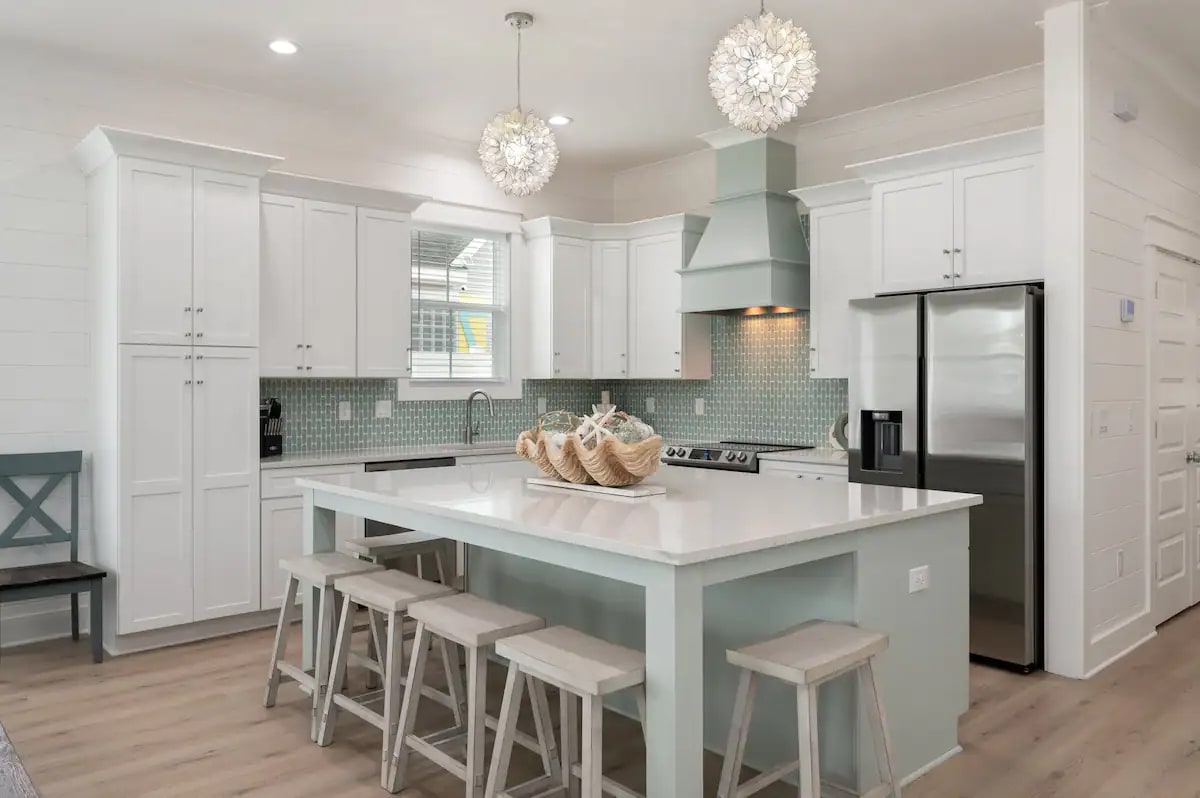 Iris-12 features a beautiful quartz island for grab-and-go meals, making beach outings effortless for your family!