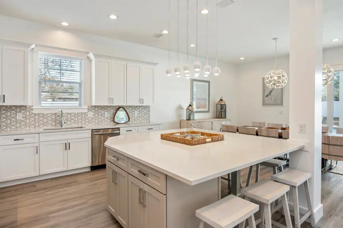 Ovation-13 features a beautiful quartz island for grab-and-go meals, making beach outings effortless for your family!