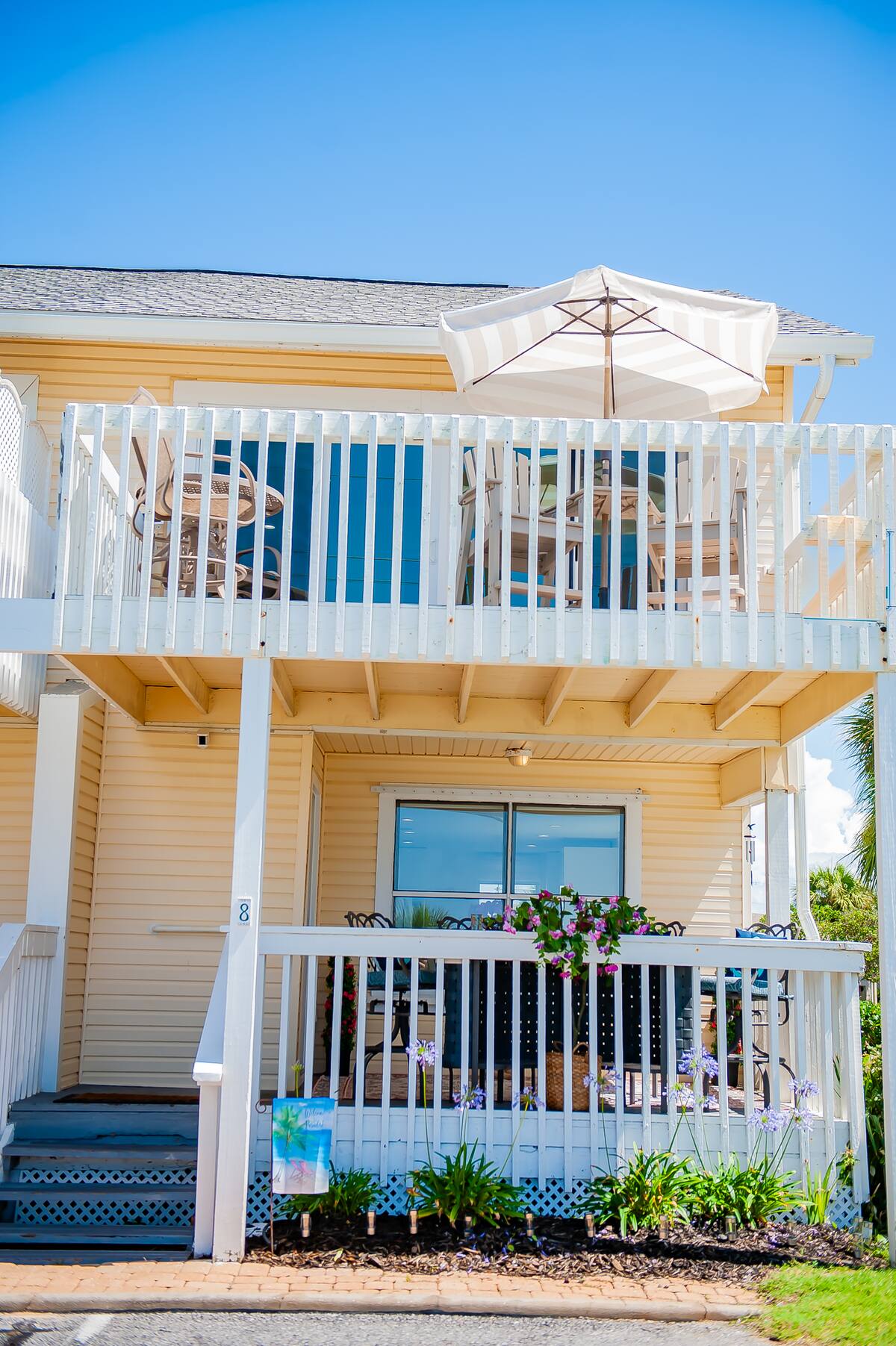 Upper deck and lower deck both with views of the ocean