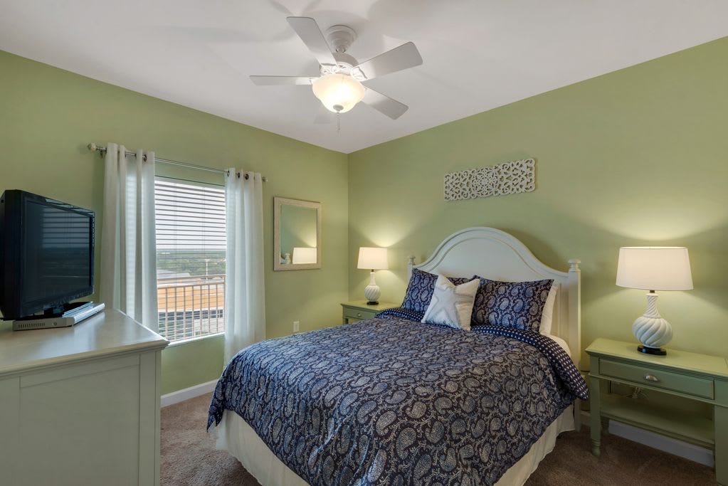 The queen bedroom is spacious, comfortable and inviting.