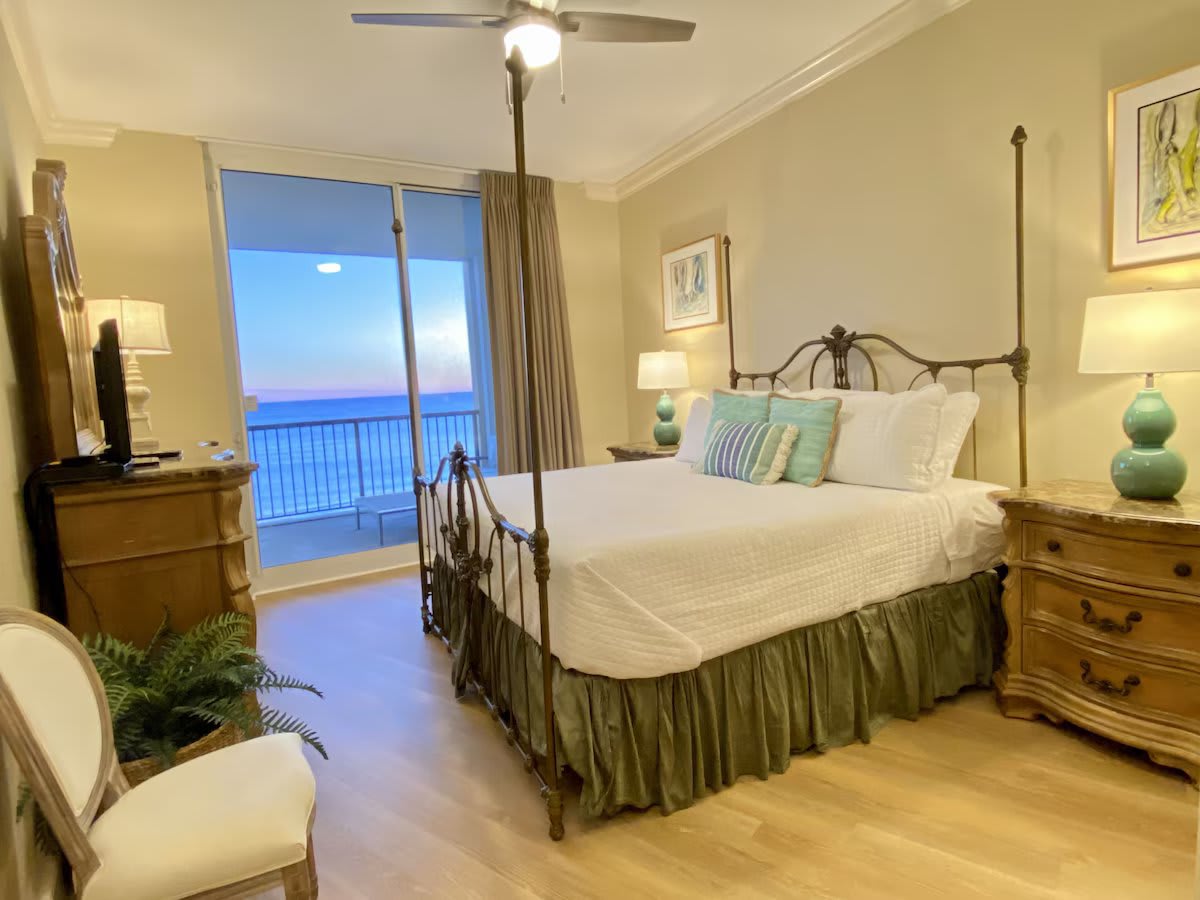 Master with King bed and attached bath with double vanity, tub, and shower