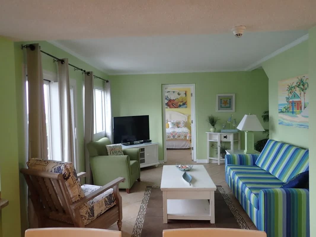 Living Room with sleeper sofa and view of Queen Bedroom