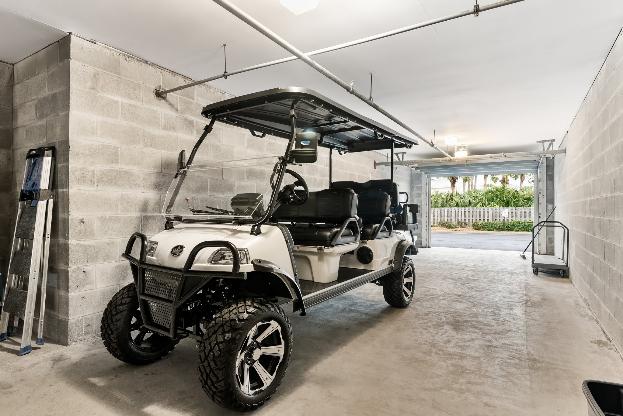 6-Person street-legal golf cart Included