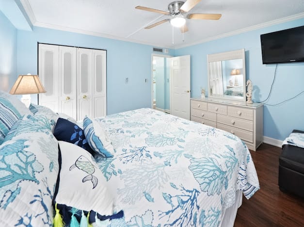 Beautiful third bedroom with a new 40 inch TV and a comfortable king bed.