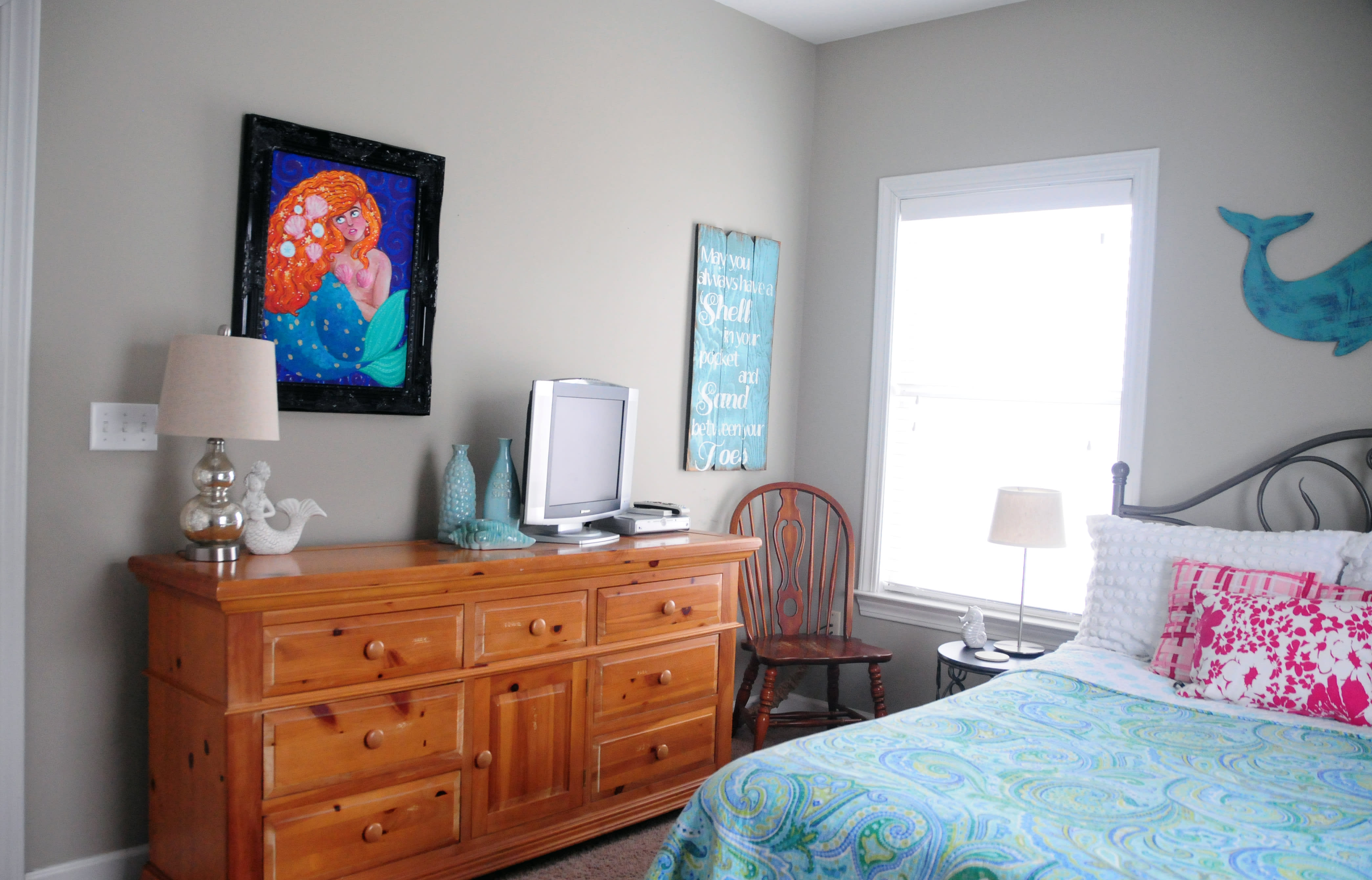 First floor bedroom with TV and dresser