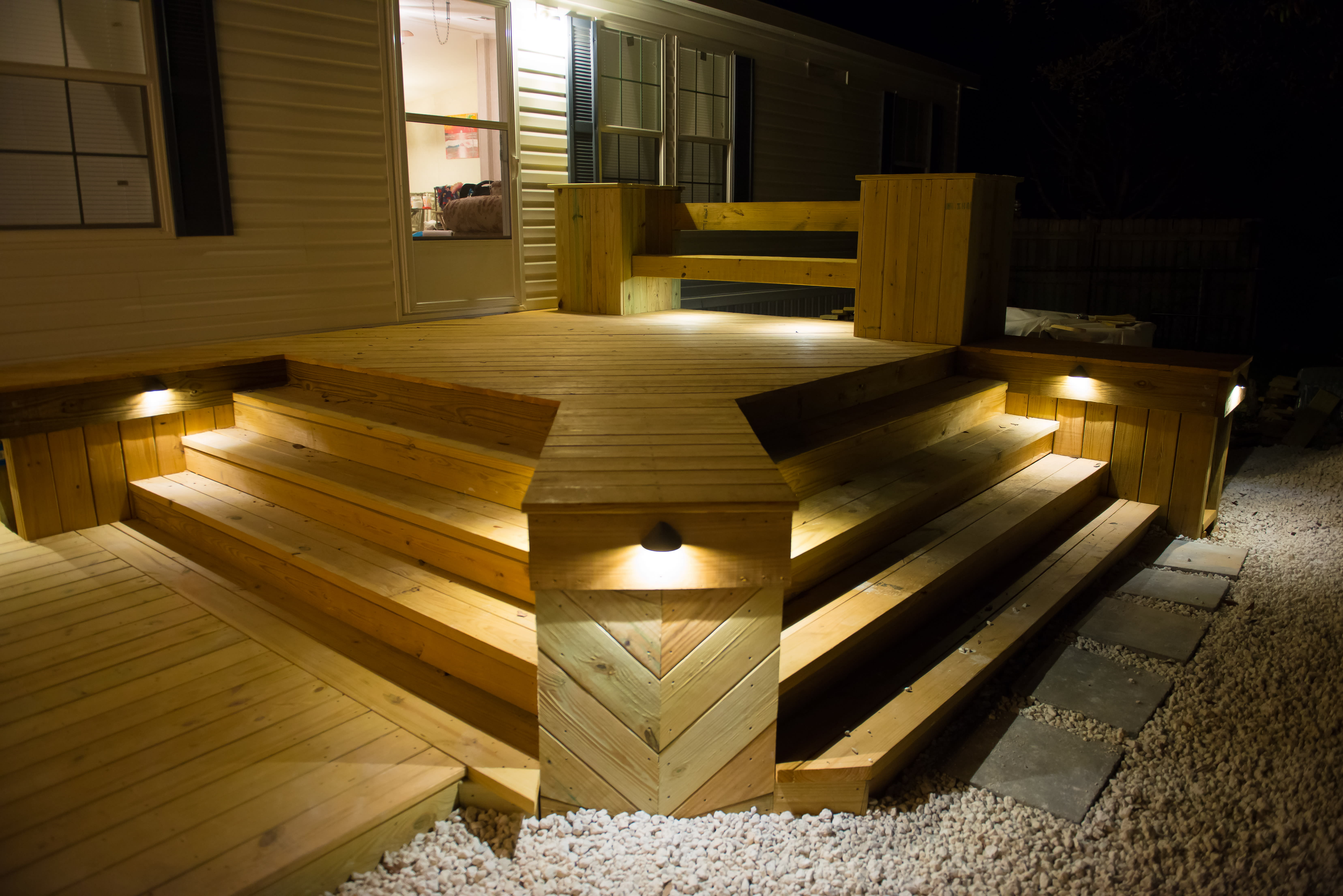 Night view of deck with Accent Lighting and String Lighting