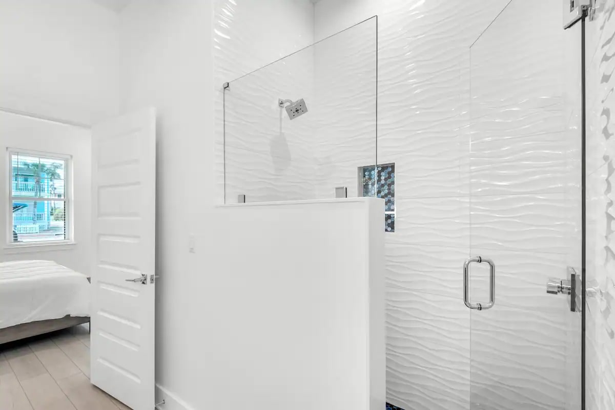 Nautilus-19 Bedroom 1 bath, pic 2. 1st floor. King with private bath. Freestanding tub, full walk-in shower, double quartz vanity.