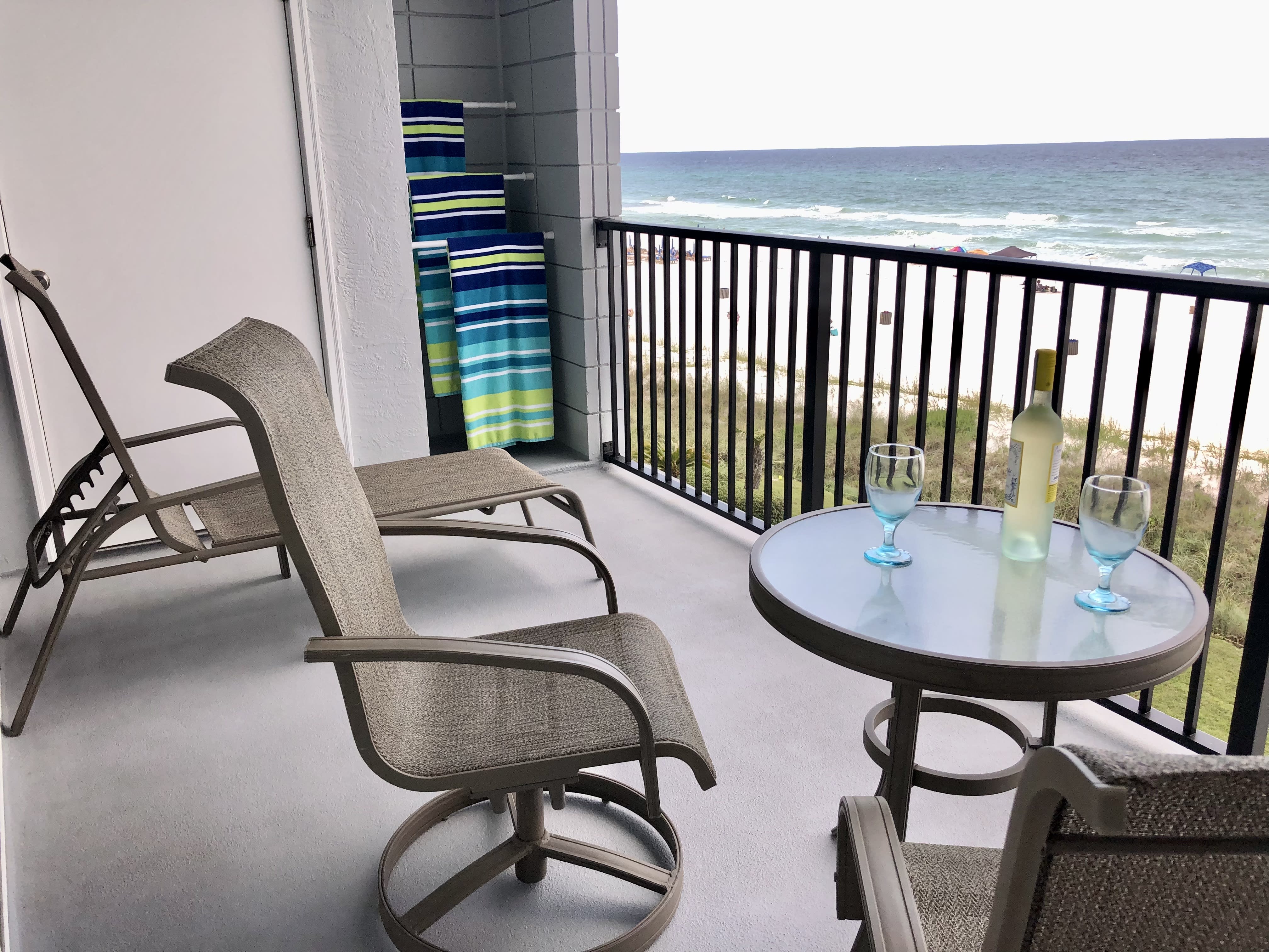 Relax on the balcony any time of day with your favorite beverage and people!  