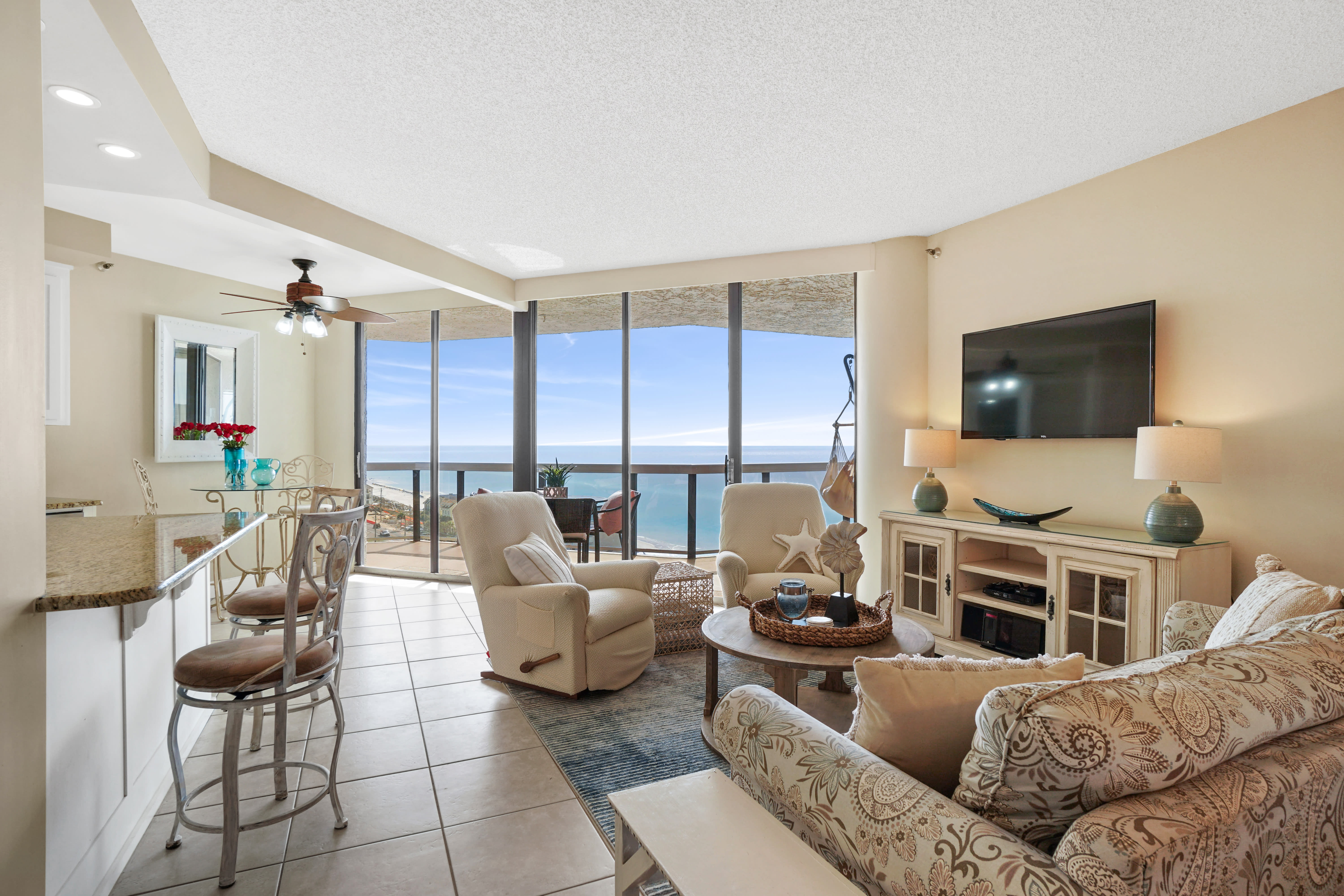 Wall to wall glass across the condo