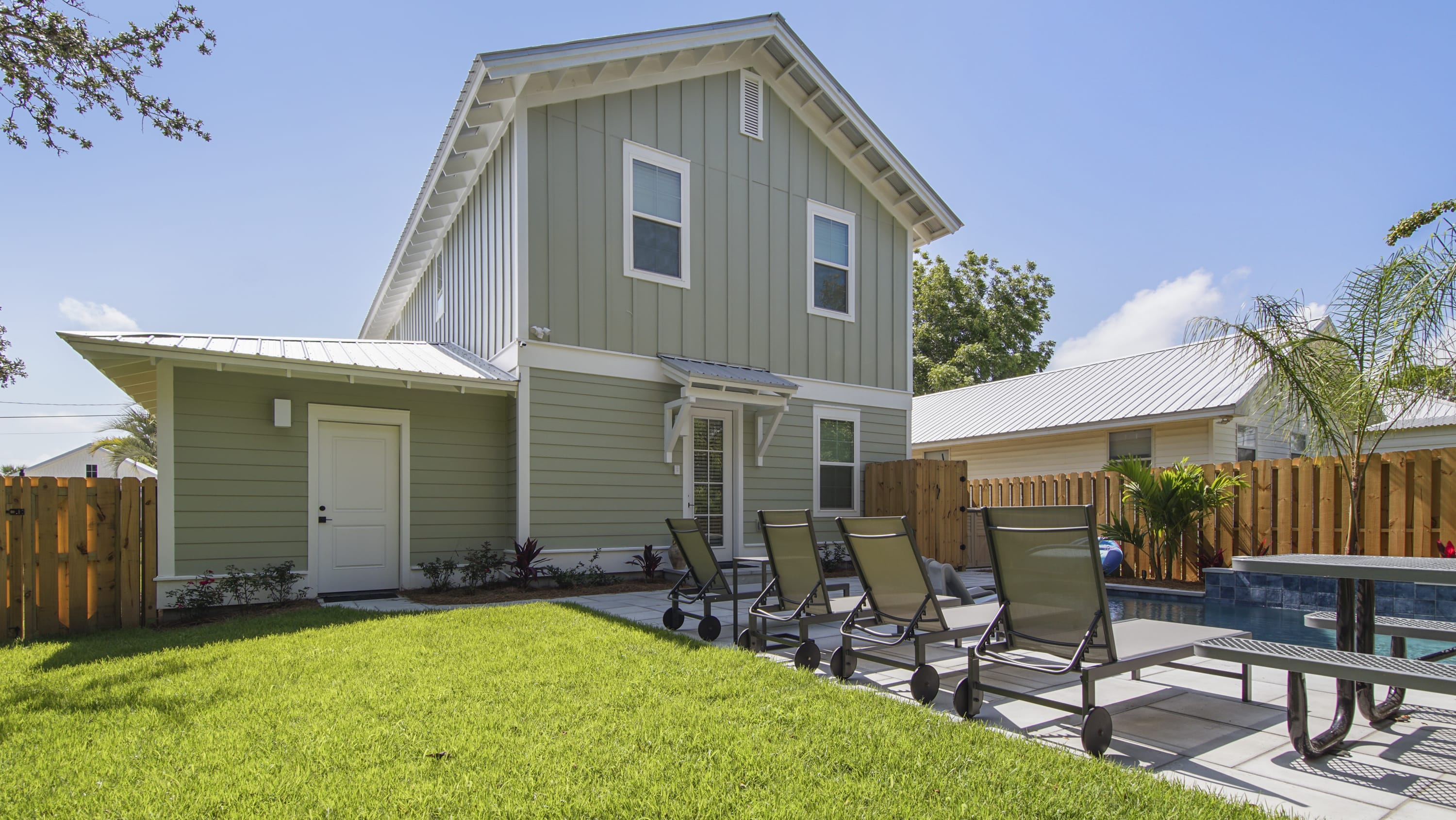 View of pool area from the grill/ fire pit area