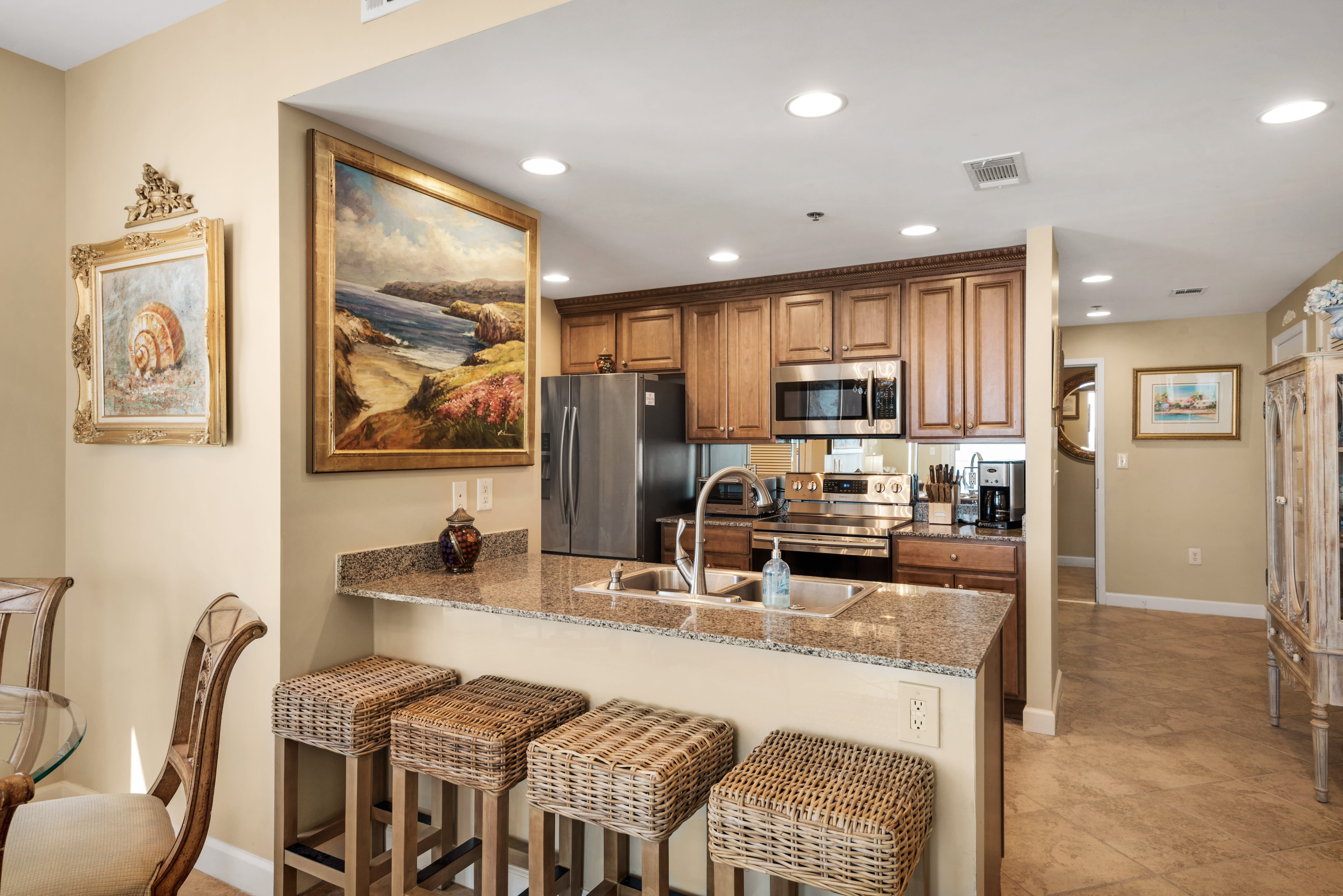 Kitchen with Eating Bar and all Stainless Steel Appliances