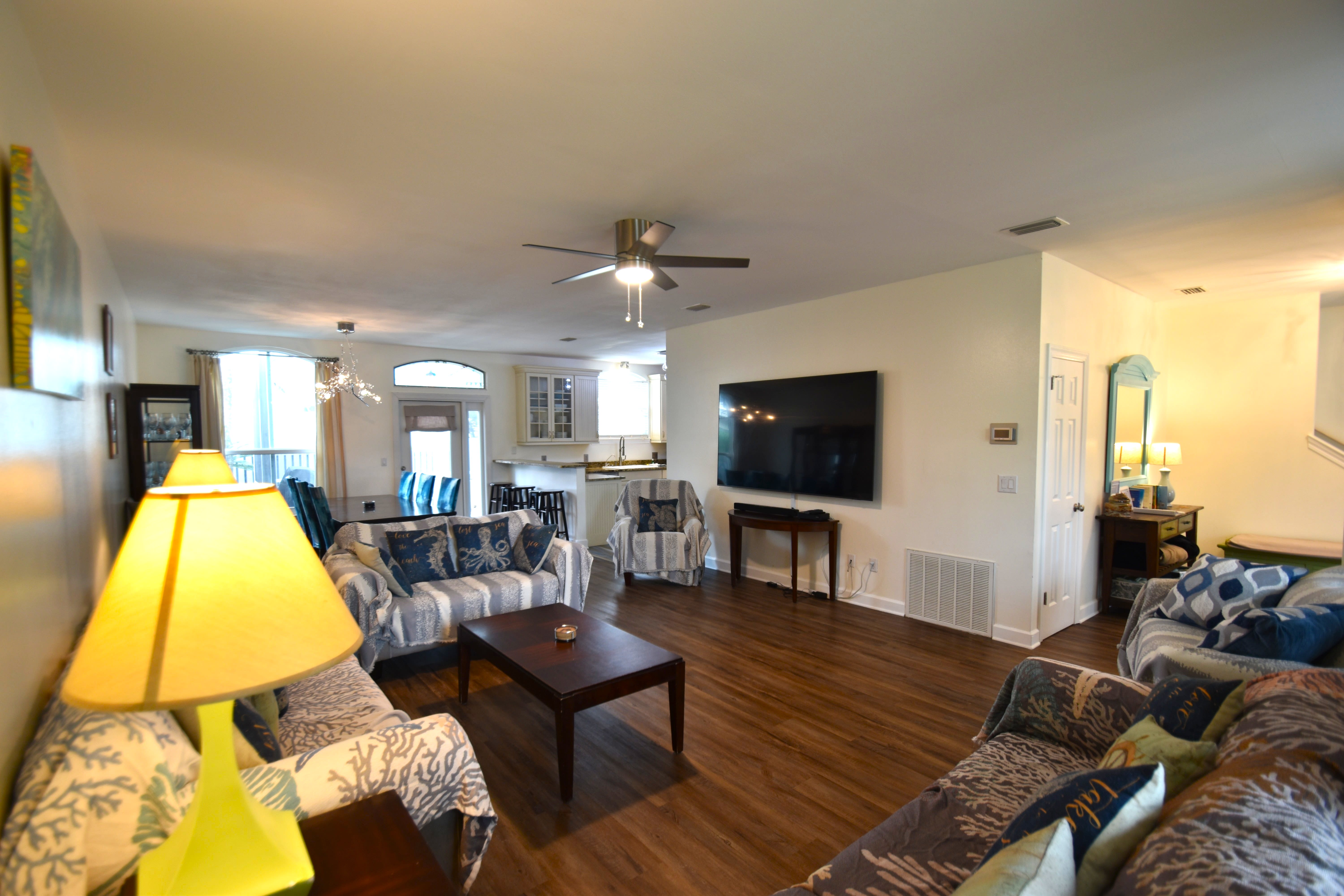 Plenty of room for everyone to relax and enjoy the 85 inch smart TV