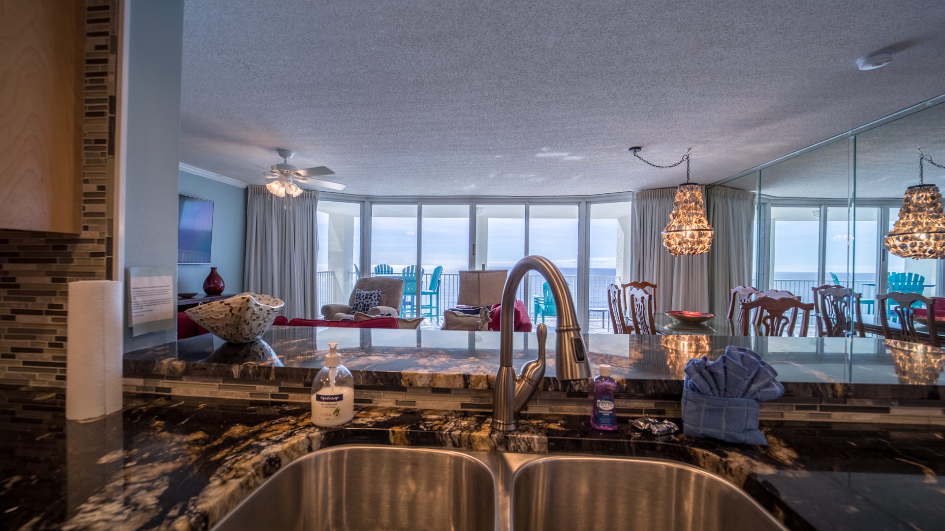 Check out the view with open concept living; 3 smart TVs, bluetooth speaker