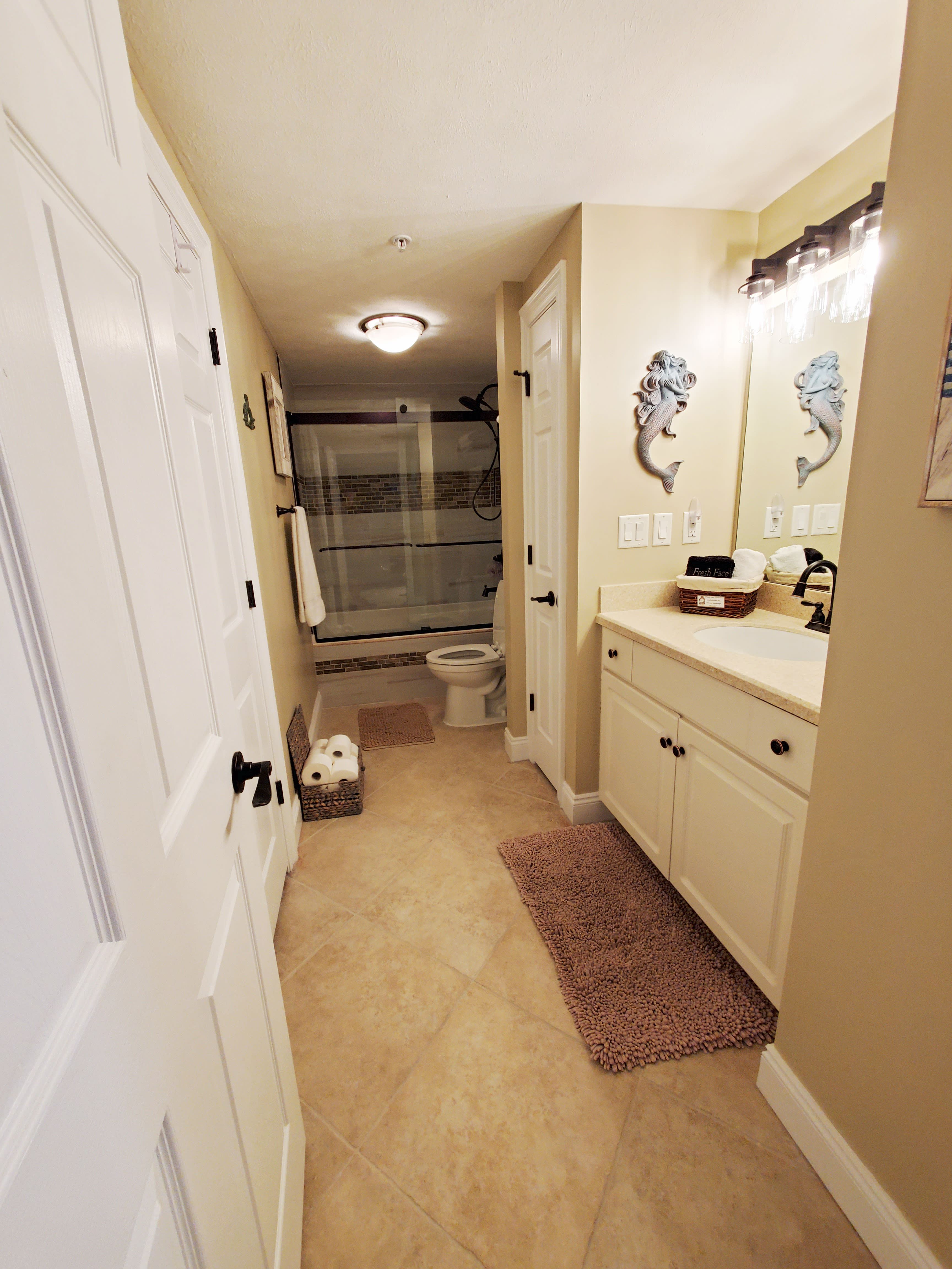 Spacious newly remodeled main bathroom, connected to 2nd bedroom.