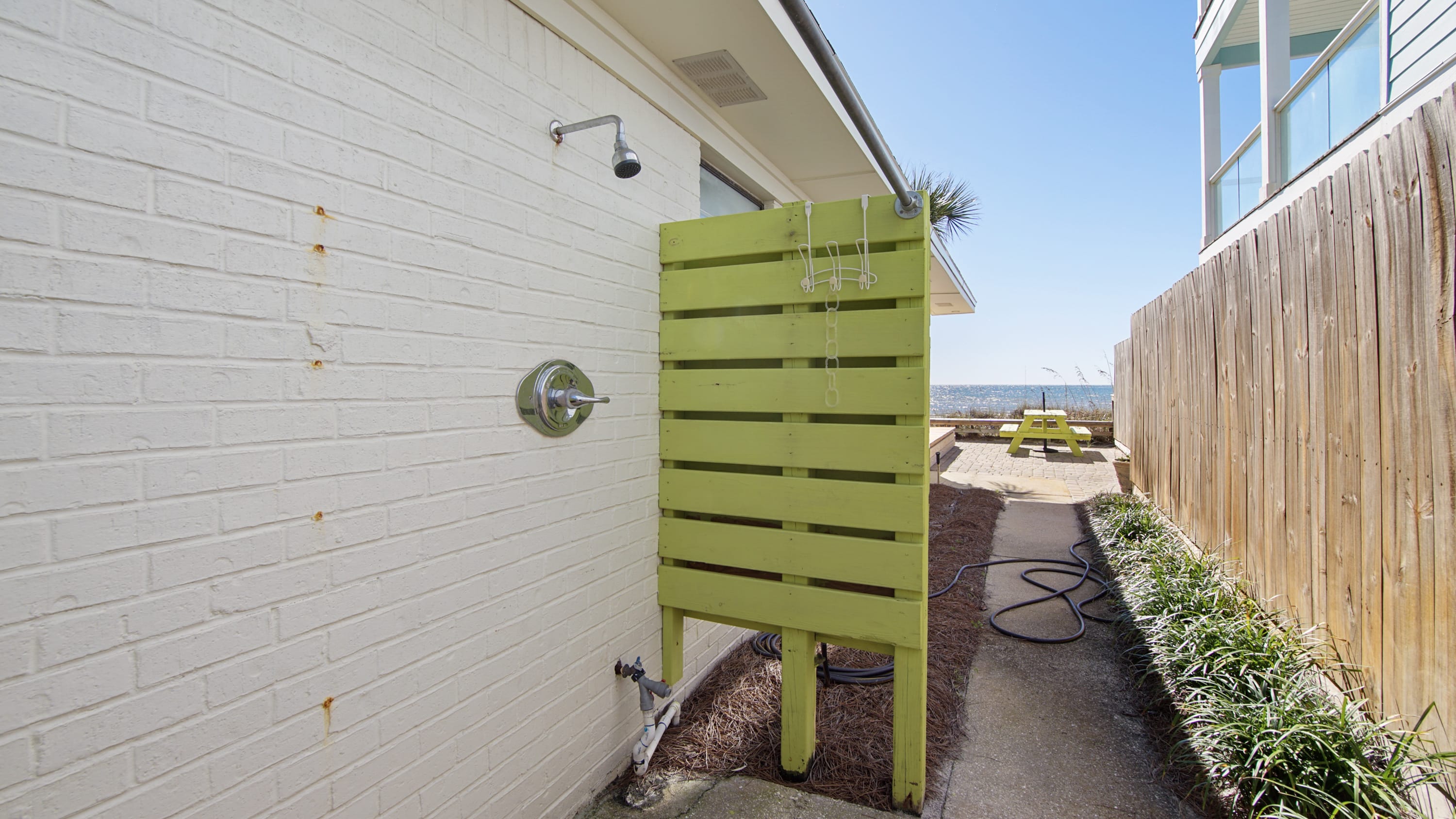 outside shower at W door to bath, also a outside shower at the E bath ext. door