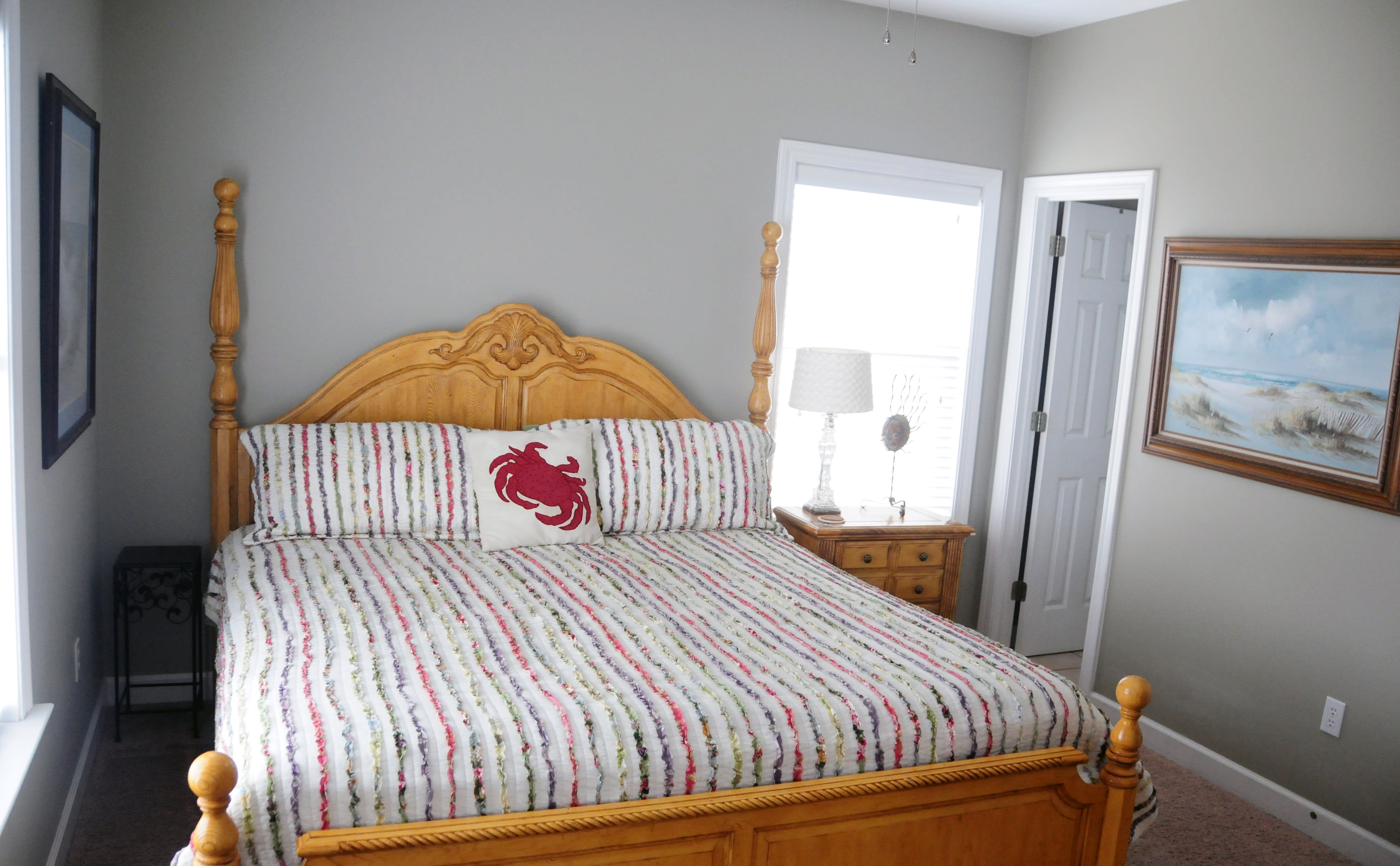 First floor master bedroom with a king size bed