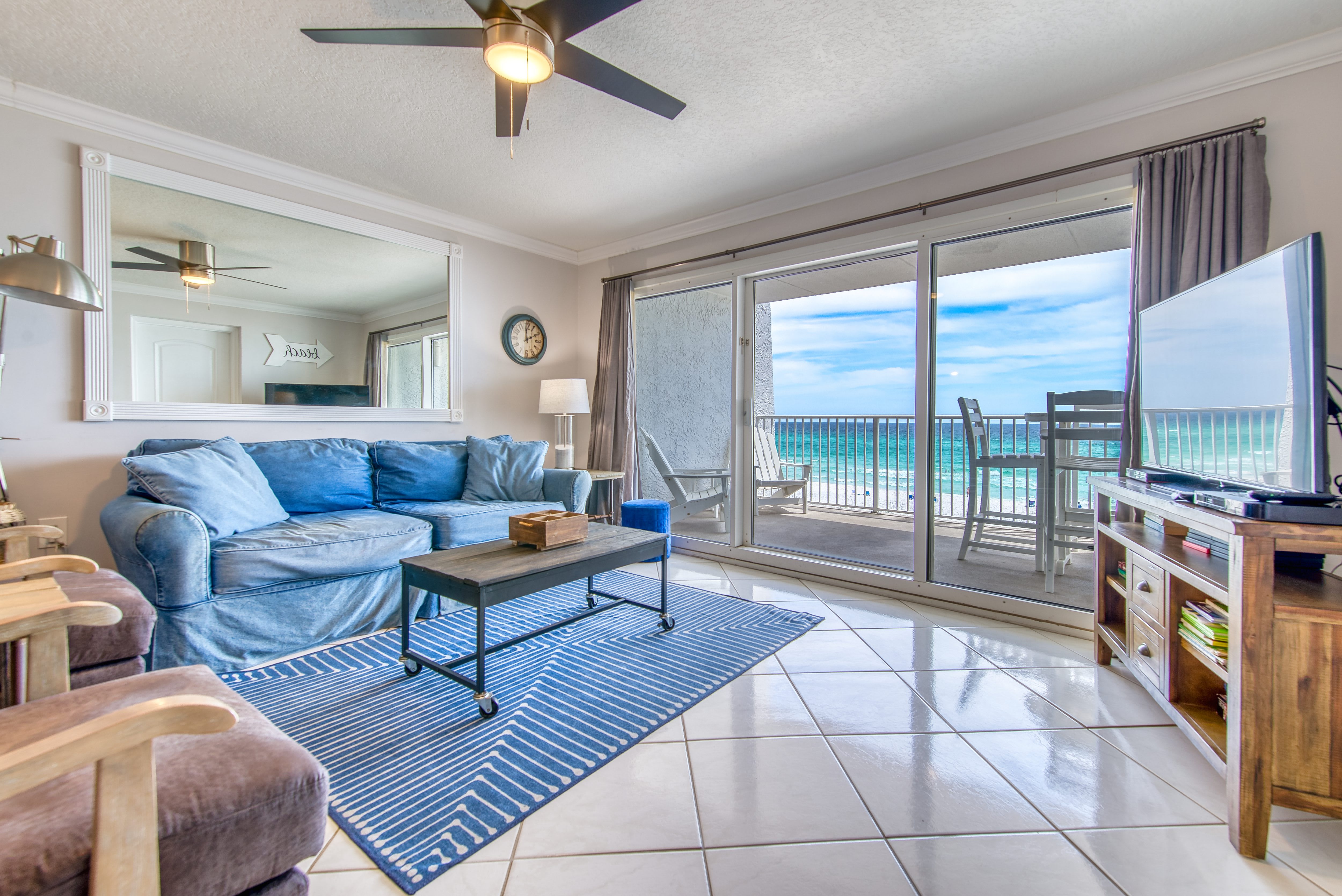 Relax in the comfy living area with stunning Gulf views!