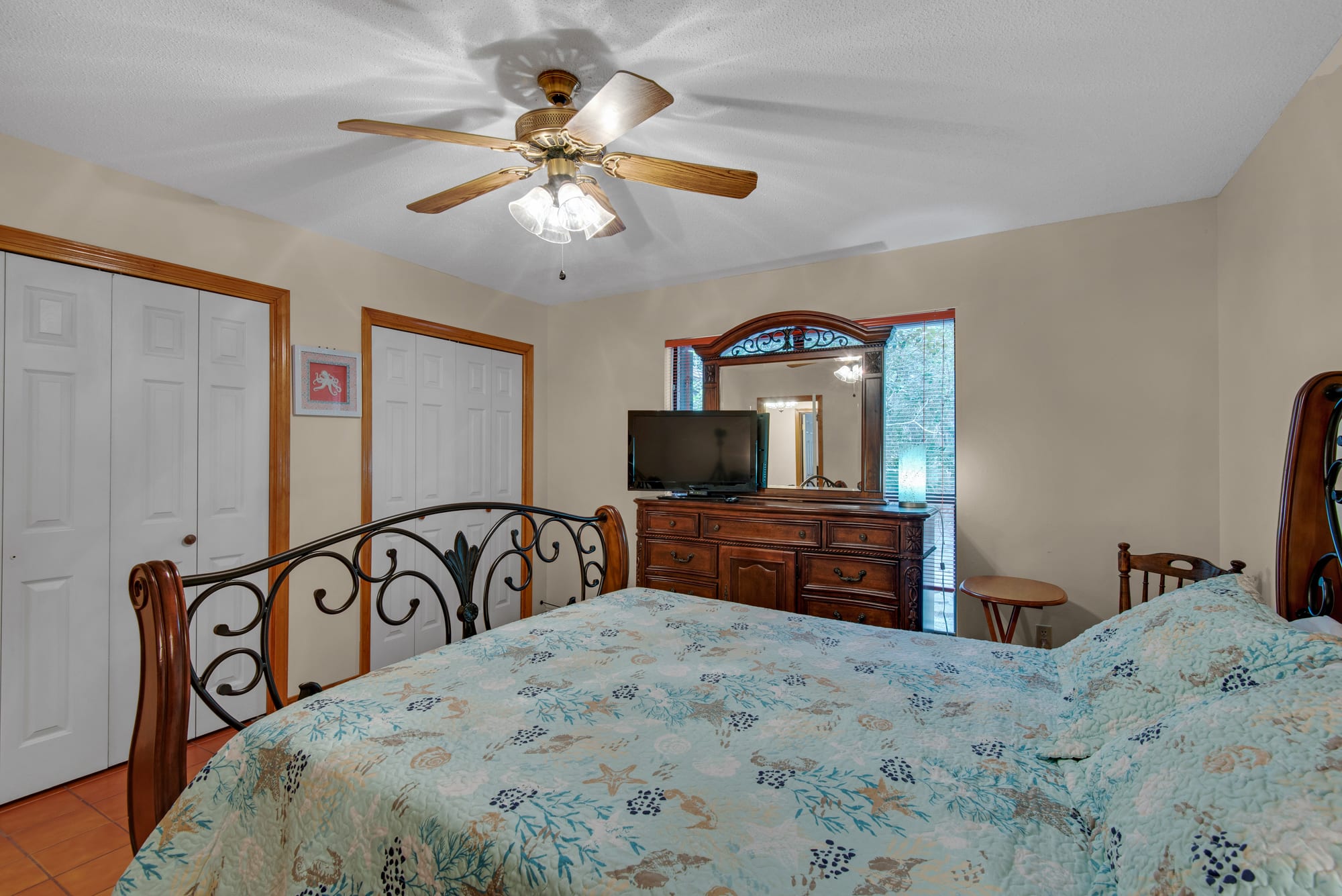 Third bedroom with Queen bed and TV and double closet.