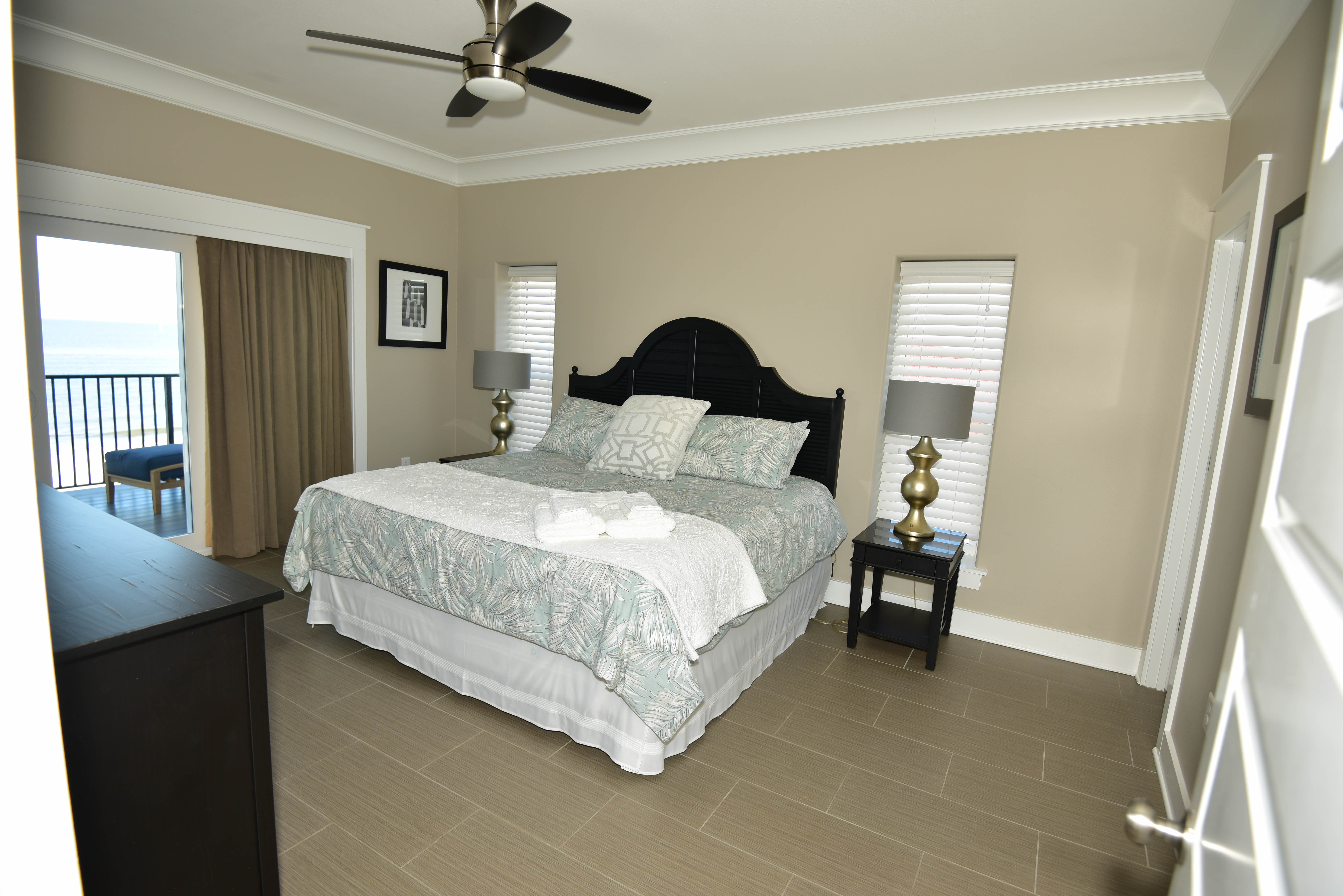 1 OF 2 - 4TH FLOOR MIRRORED KING MASTERS W/EN-SUITE OPENS TO GULF FRONT DECK.