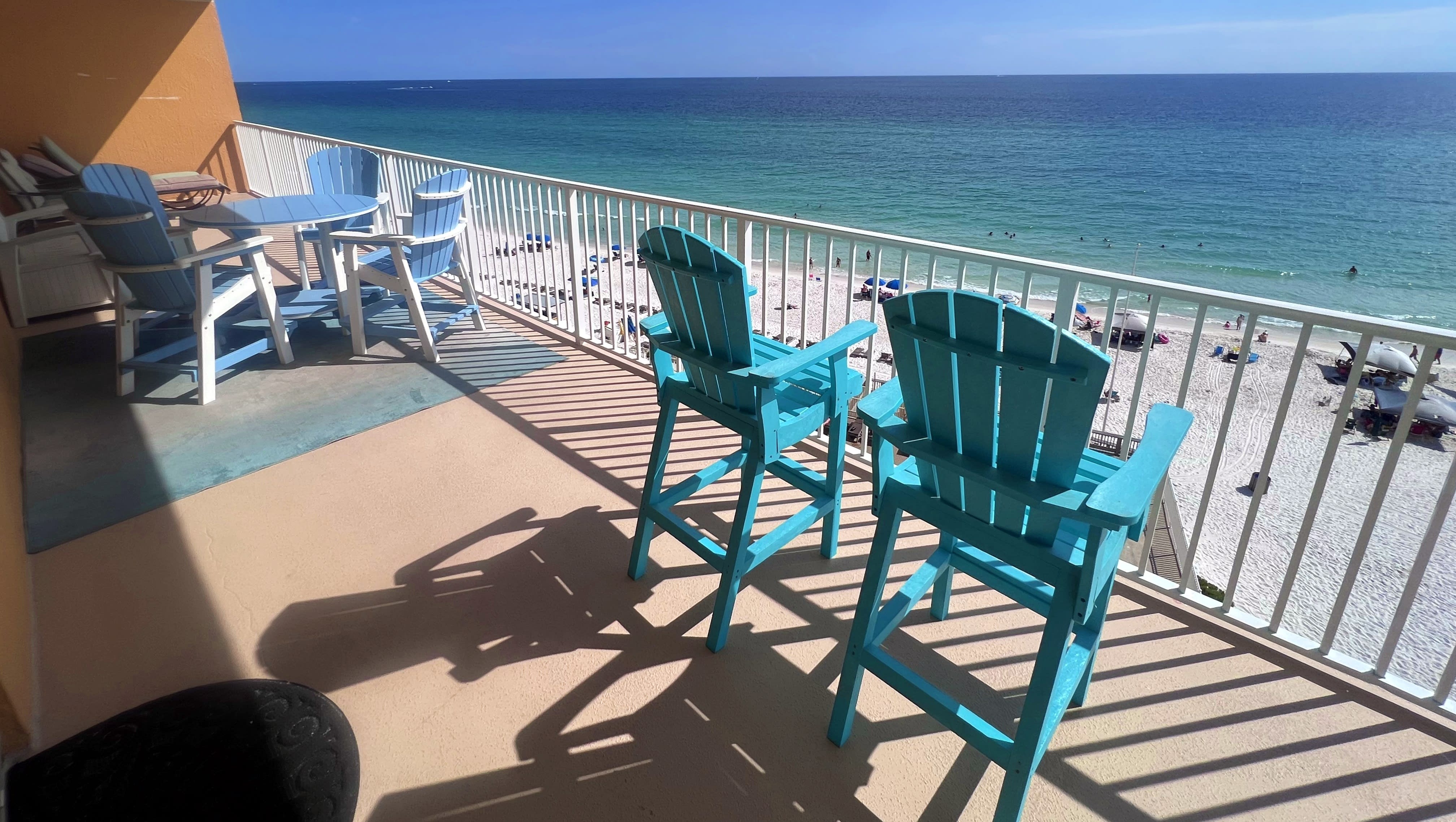 Pollywood Bar-height Captain Chairs on wrap around balcony with Gulf view