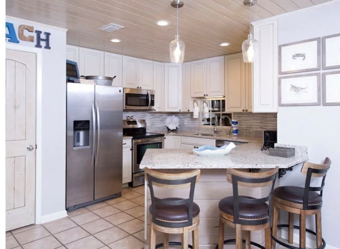 Bar seating for 3 in this beautifully remodeled kitchen! 