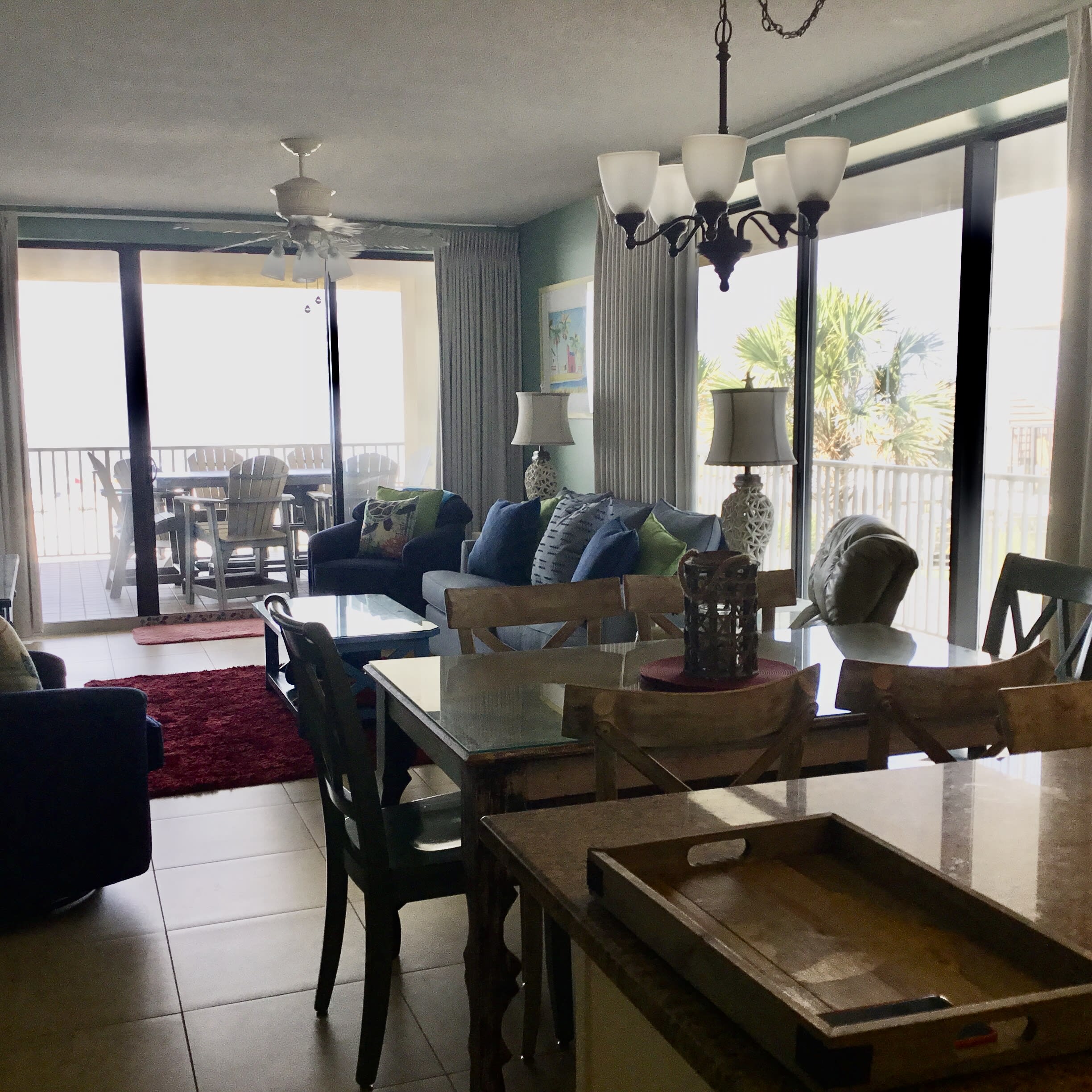 Relax in large living area surrounded by beautiful views at every turn