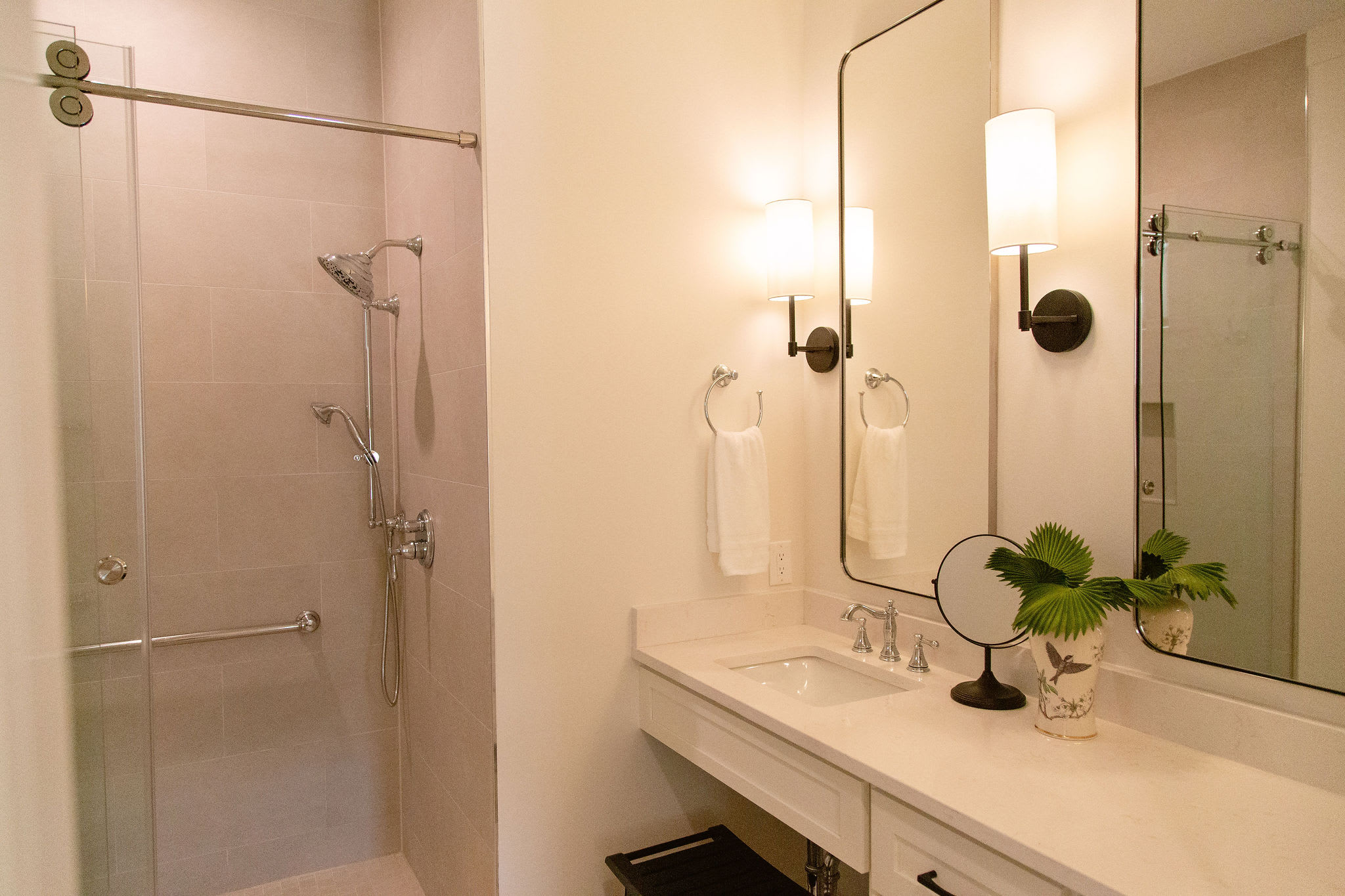 1st floor on-suite bath with grab bars and roll under sink for mobility impaired