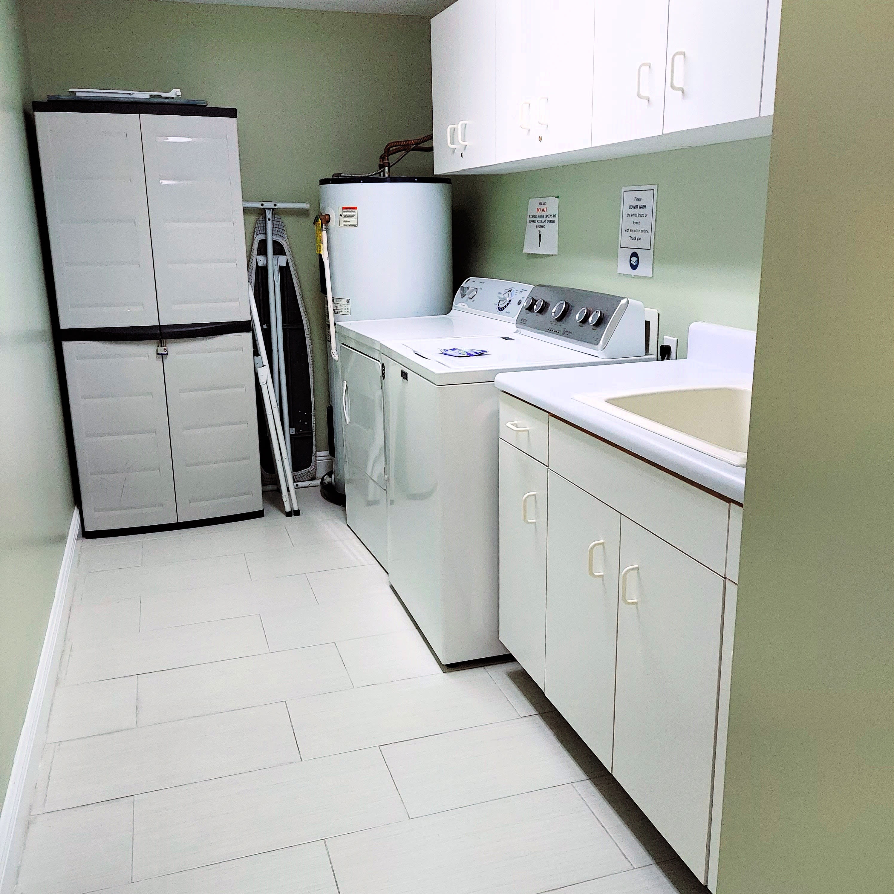Large Laundry Room With Full Size Washer/Dryer