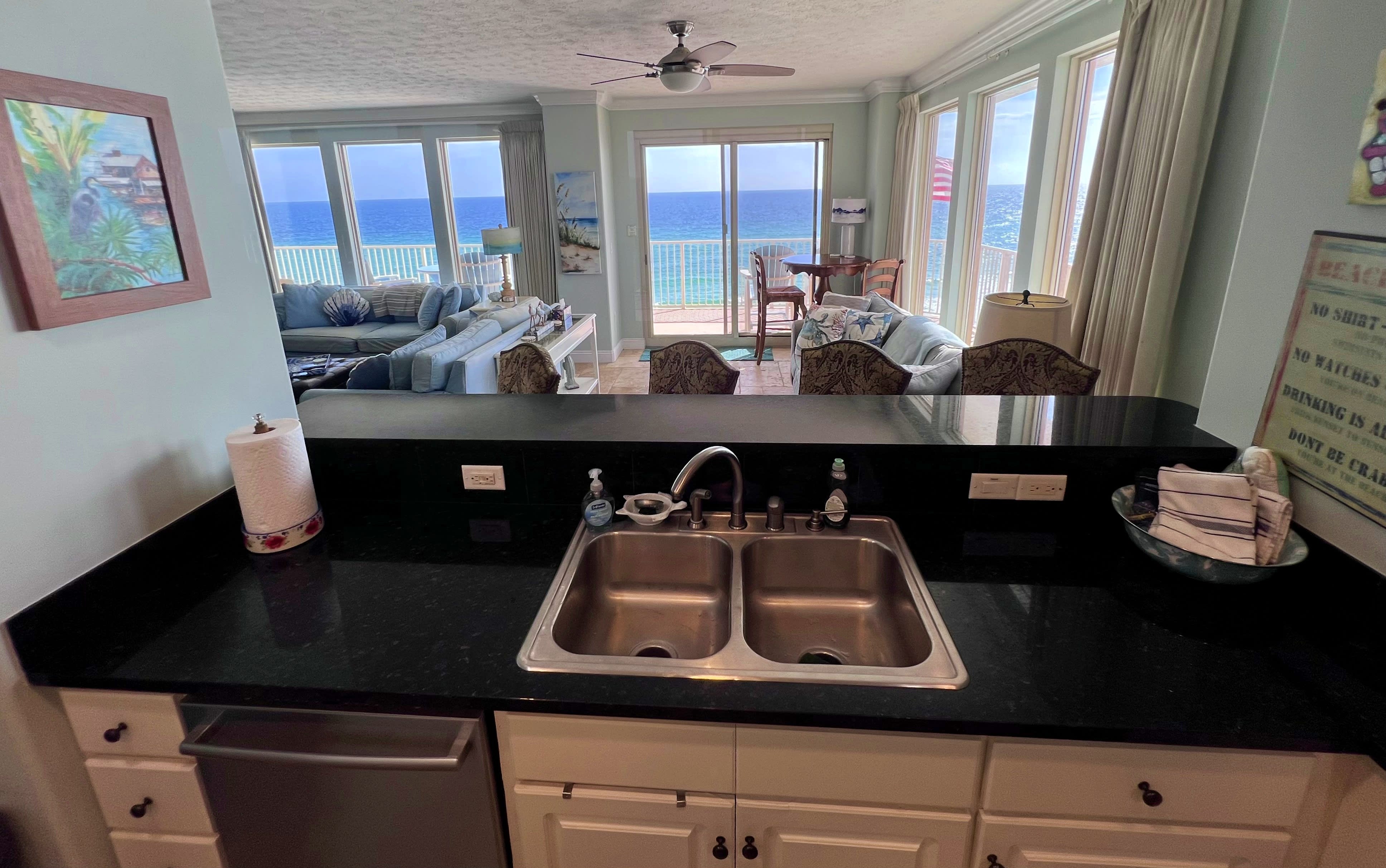 View from our Kitchen with stainless steel appliances, granite counter tops with view of Gulf