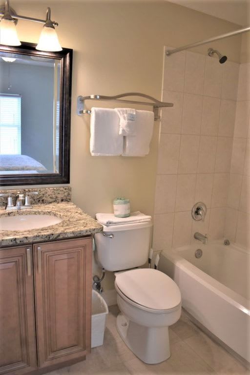 Bedroom 2 Guest king bdrm private full bathroom.