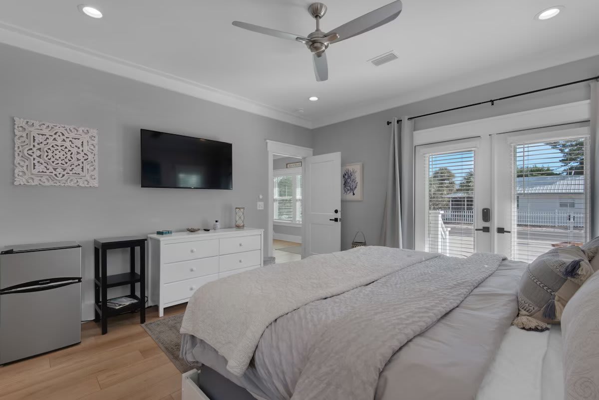 French doors let in natural light or use the blackout curtains to sleep in.