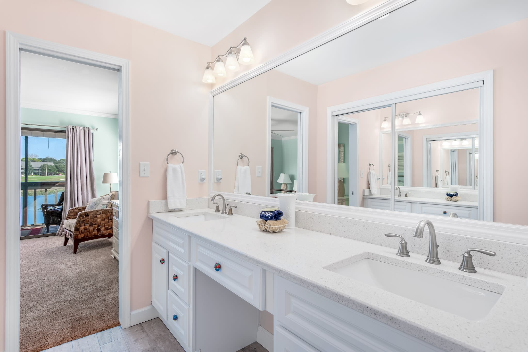 Master bath has twin vanities, separate shower and water closet
