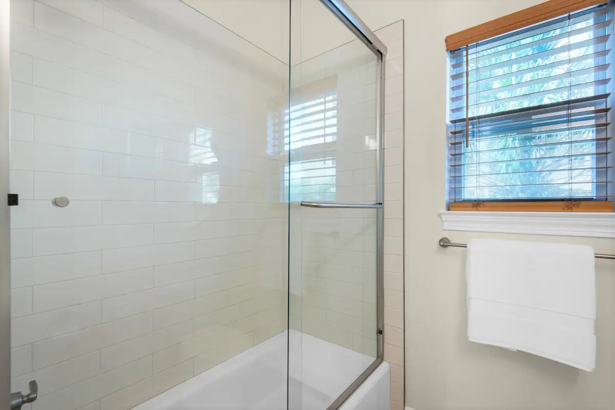 Shipwatch-24...1st floor. Shared hall full bath. with frameless glass tub/shower combo. Photo 2